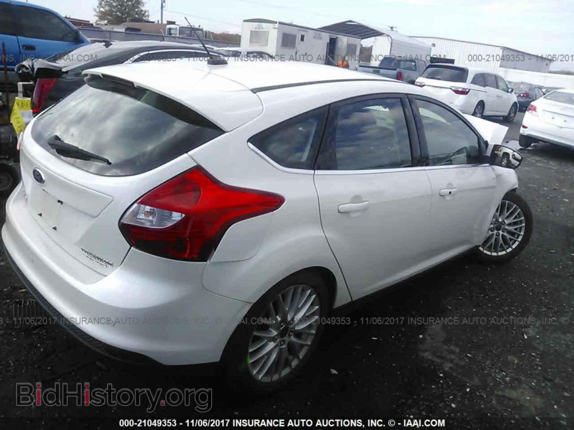 2014 Ford Focus - VIN: 1FADP3N22EL329688 - Фото 4