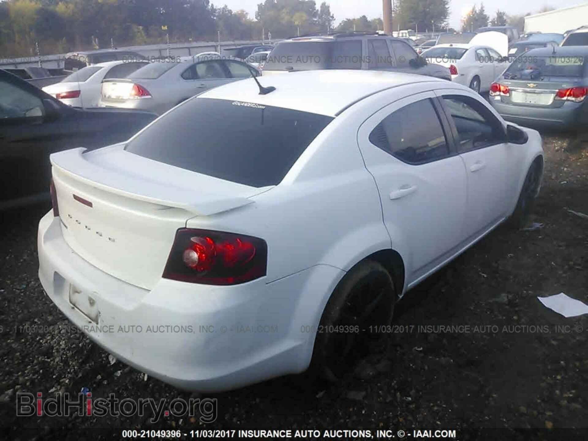 2013 Dodge Avenger - VIN: 1C3CDZAG4DN751083 - Photo 4