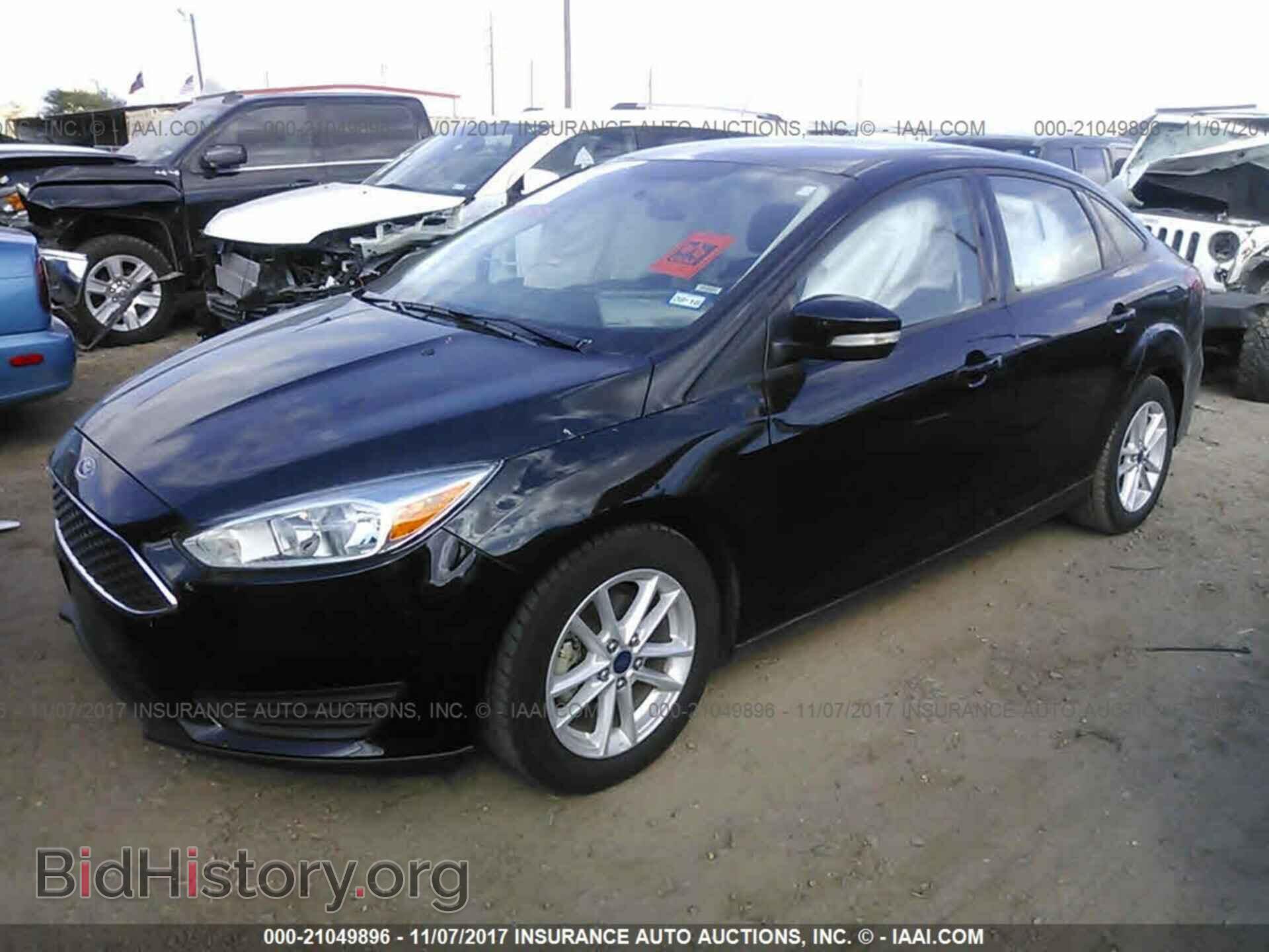 2016 Ford Focus - VIN: 1FADP3F21GL271154 - Photo 2