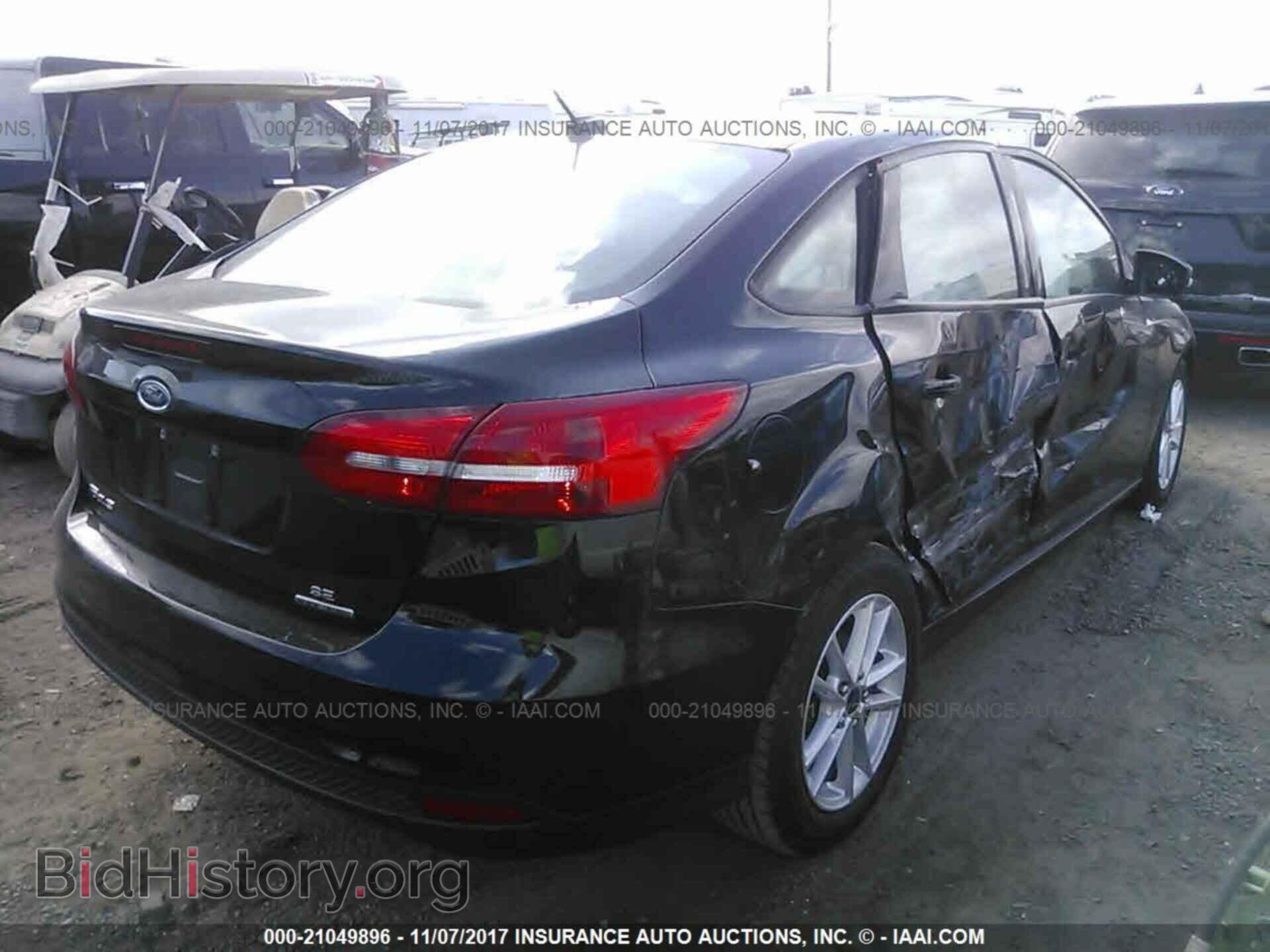 2016 Ford Focus - VIN: 1FADP3F21GL271154 - Photo 4