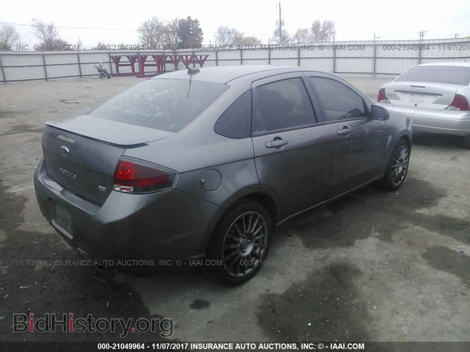 2011 Ford Focus - VIN: 1FAHP3GN1BW166101 - Фото 4