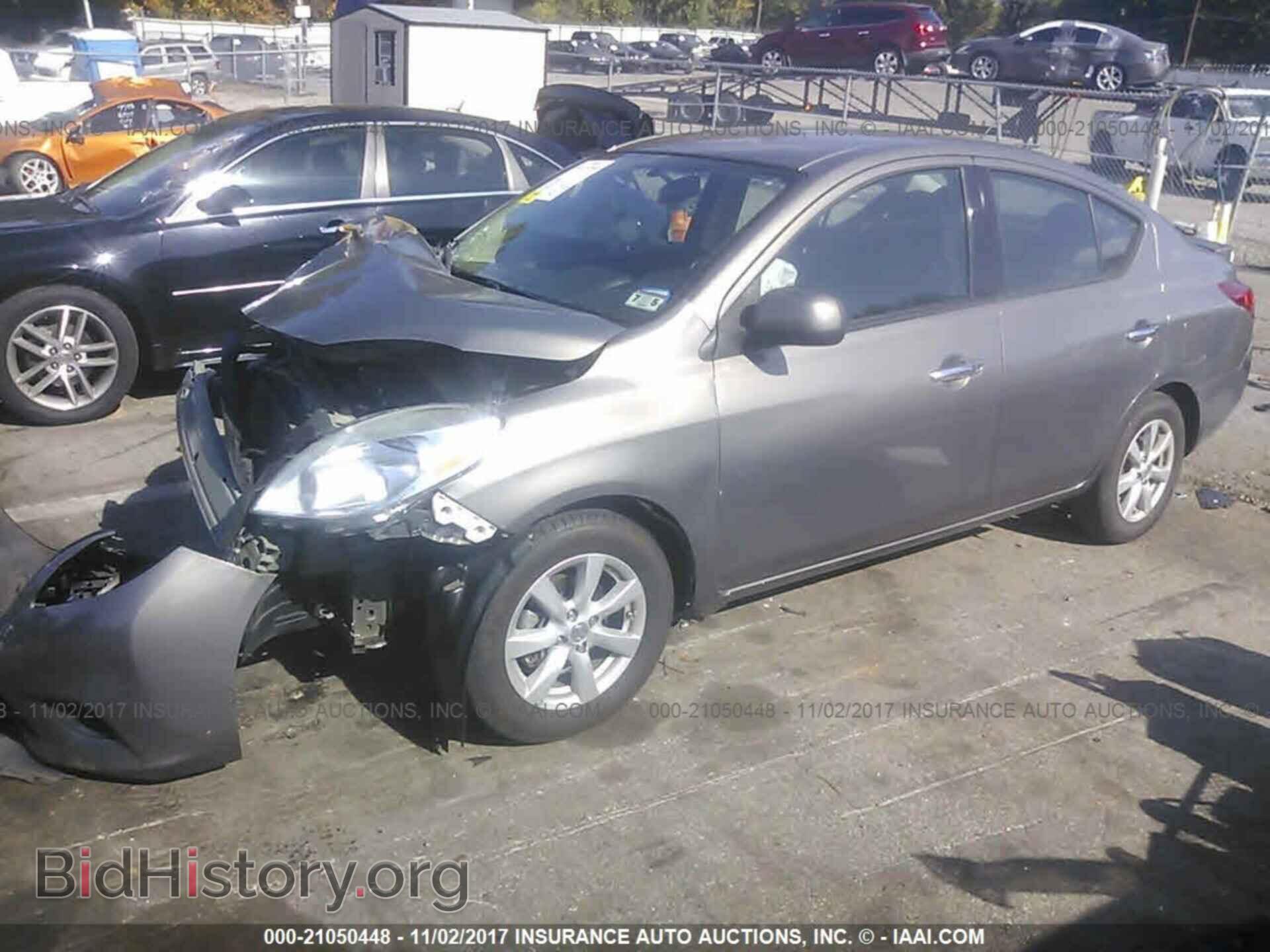 2014 Nissan Versa - VIN: 3N1CN7AP9EL823896 - Фото 2