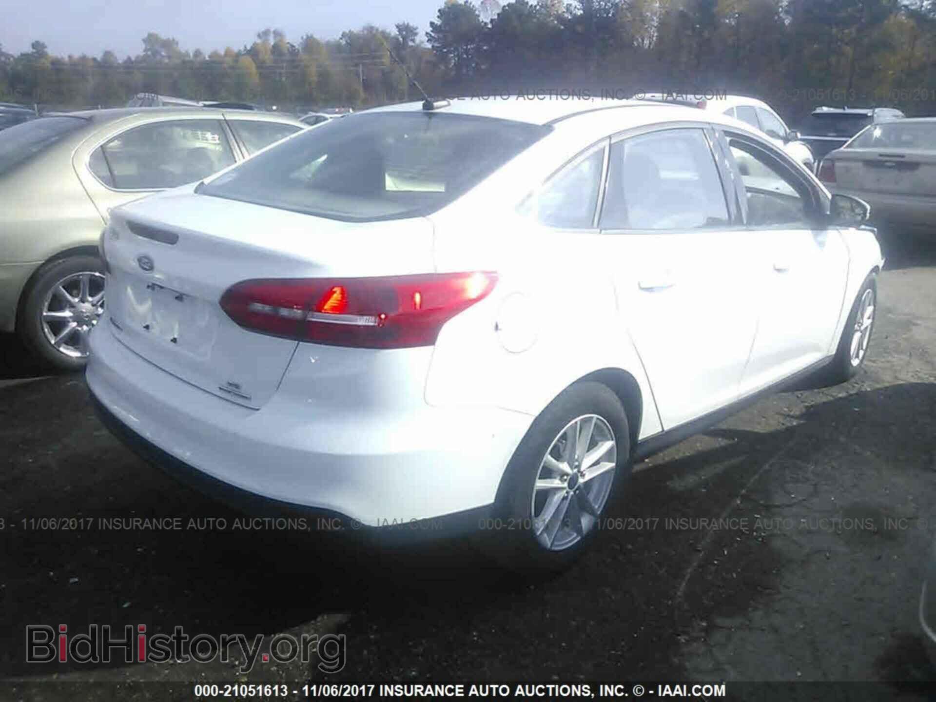 2016 Ford Focus - VIN: 1FADP3F25GL266104 - Фото 4