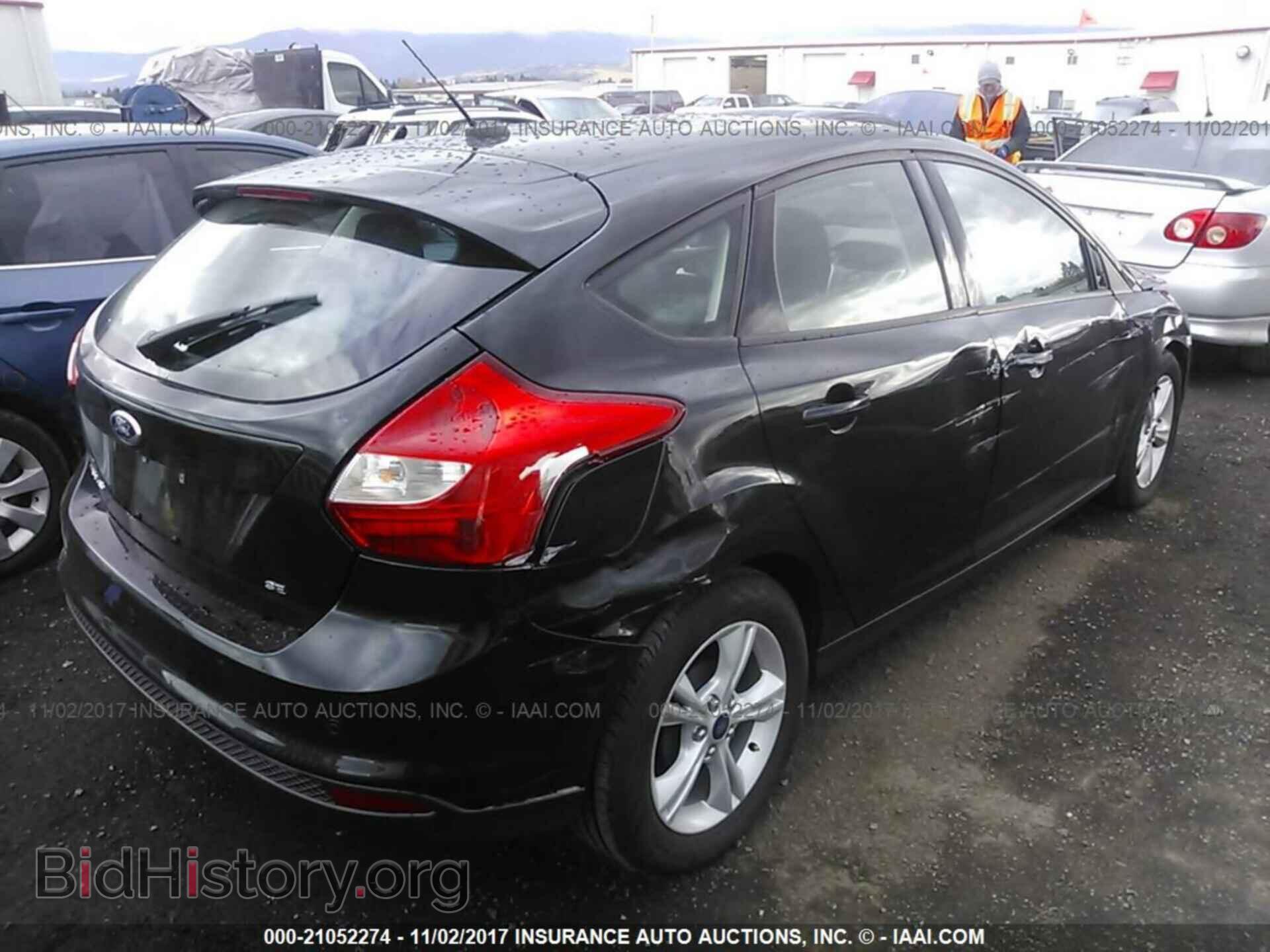 2014 Ford Focus - VIN: 1FADP3K29EL433342 - Photo 4