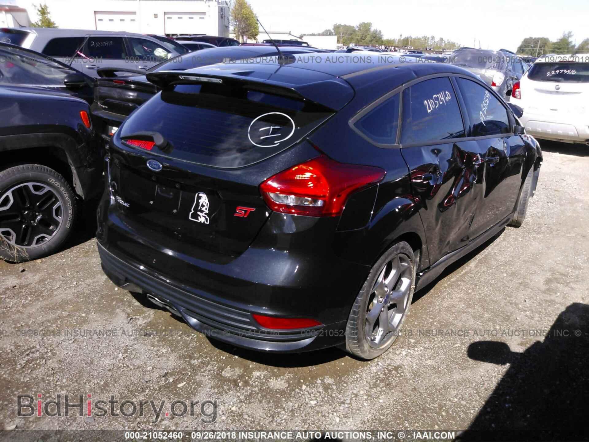 2015 Ford Focus - VIN: 1FADP3L99FL355755 - Photo 4