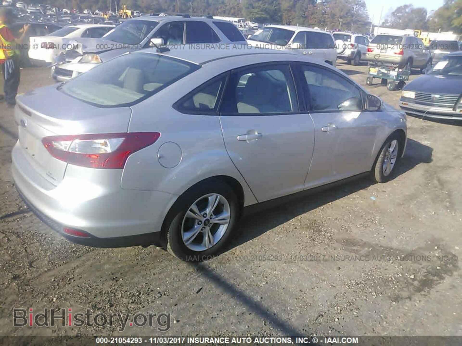 2014 Ford Focus - VIN: 1FADP3F26EL113017 - Фото 4
