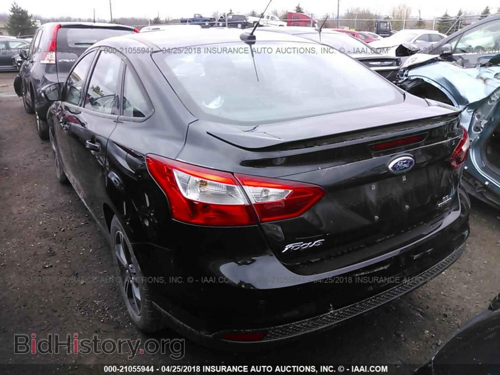 2014 Ford Focus - VIN: 1FADP3F24EL450933 - Фото 3