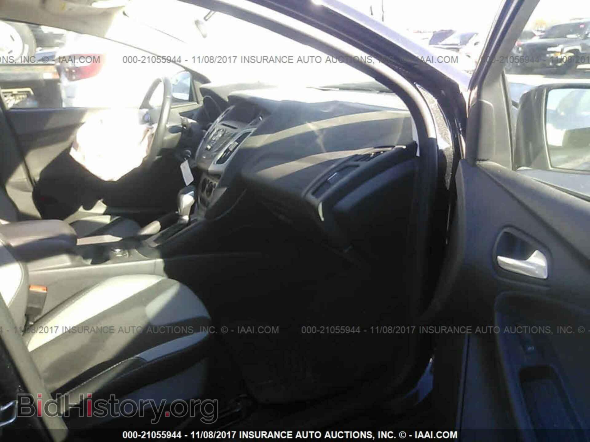 2014 Ford Focus - VIN: 1FADP3F24EL450933 - Фото 5