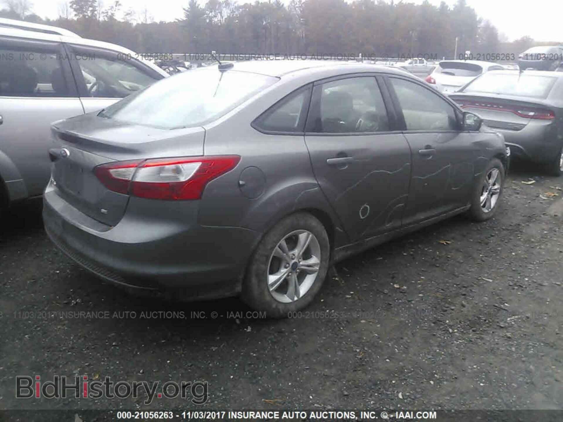 2014 Ford Focus - VIN: 1FADP3F29EL388672 - Фото 4