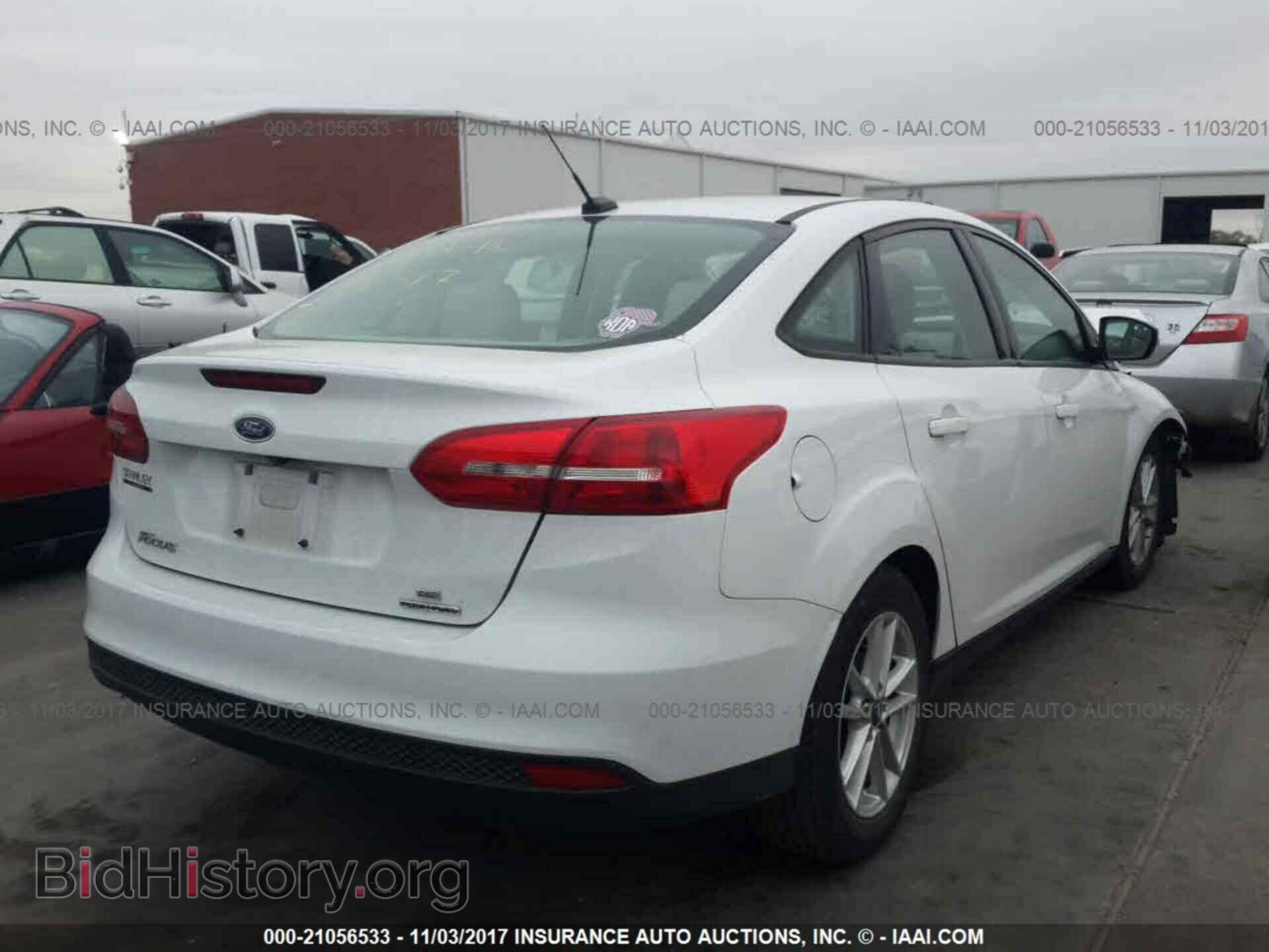2016 Ford Focus - VIN: 1FADP3F24GL310058 - Photo 4