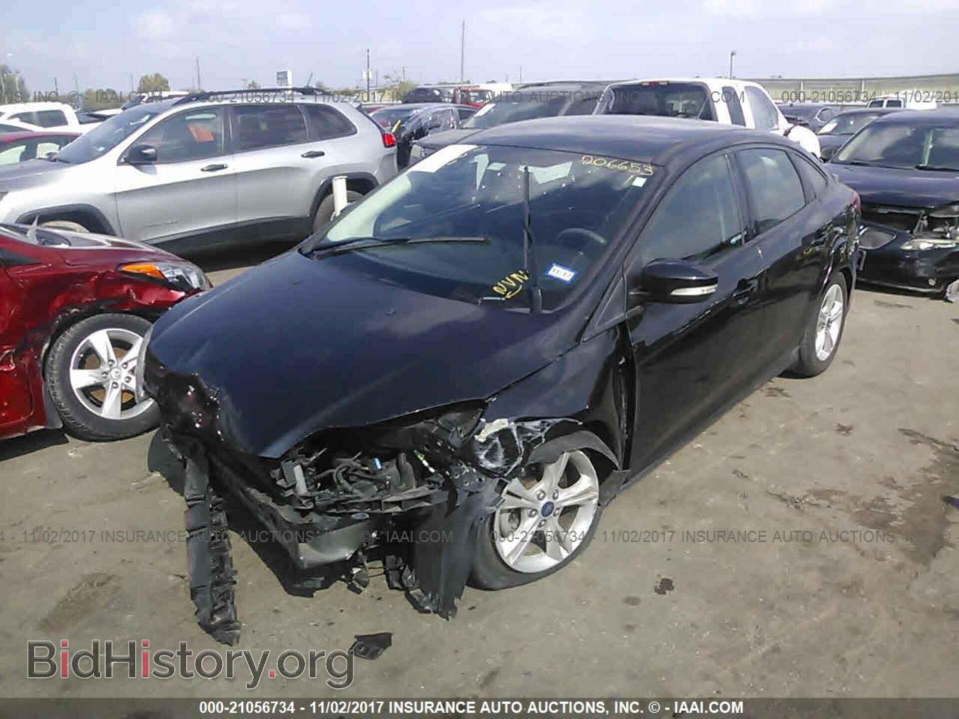 2014 Ford Focus - VIN: 1FADP3F28EL372348 - Фото 2