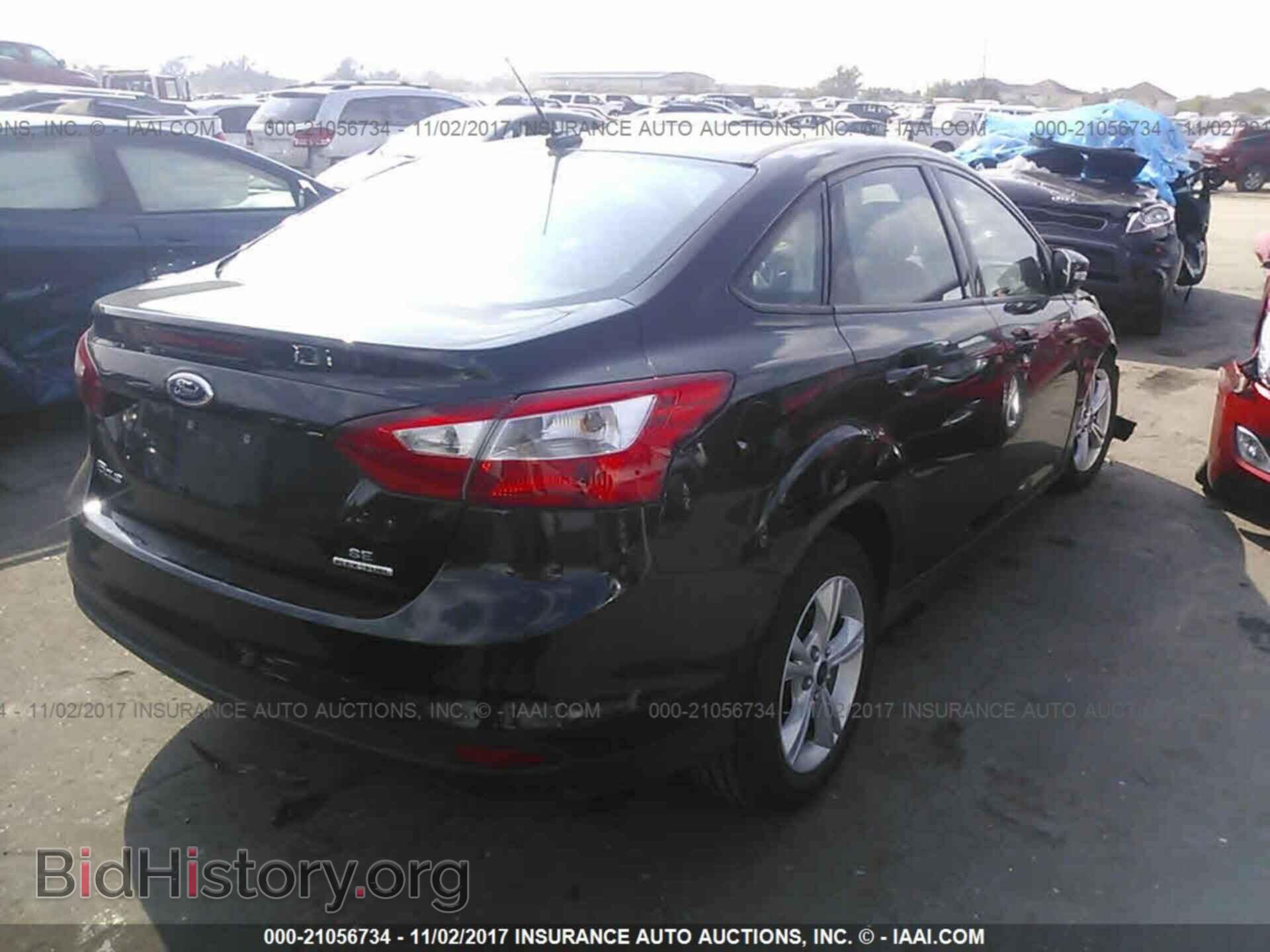 2014 Ford Focus - VIN: 1FADP3F28EL372348 - Фото 4