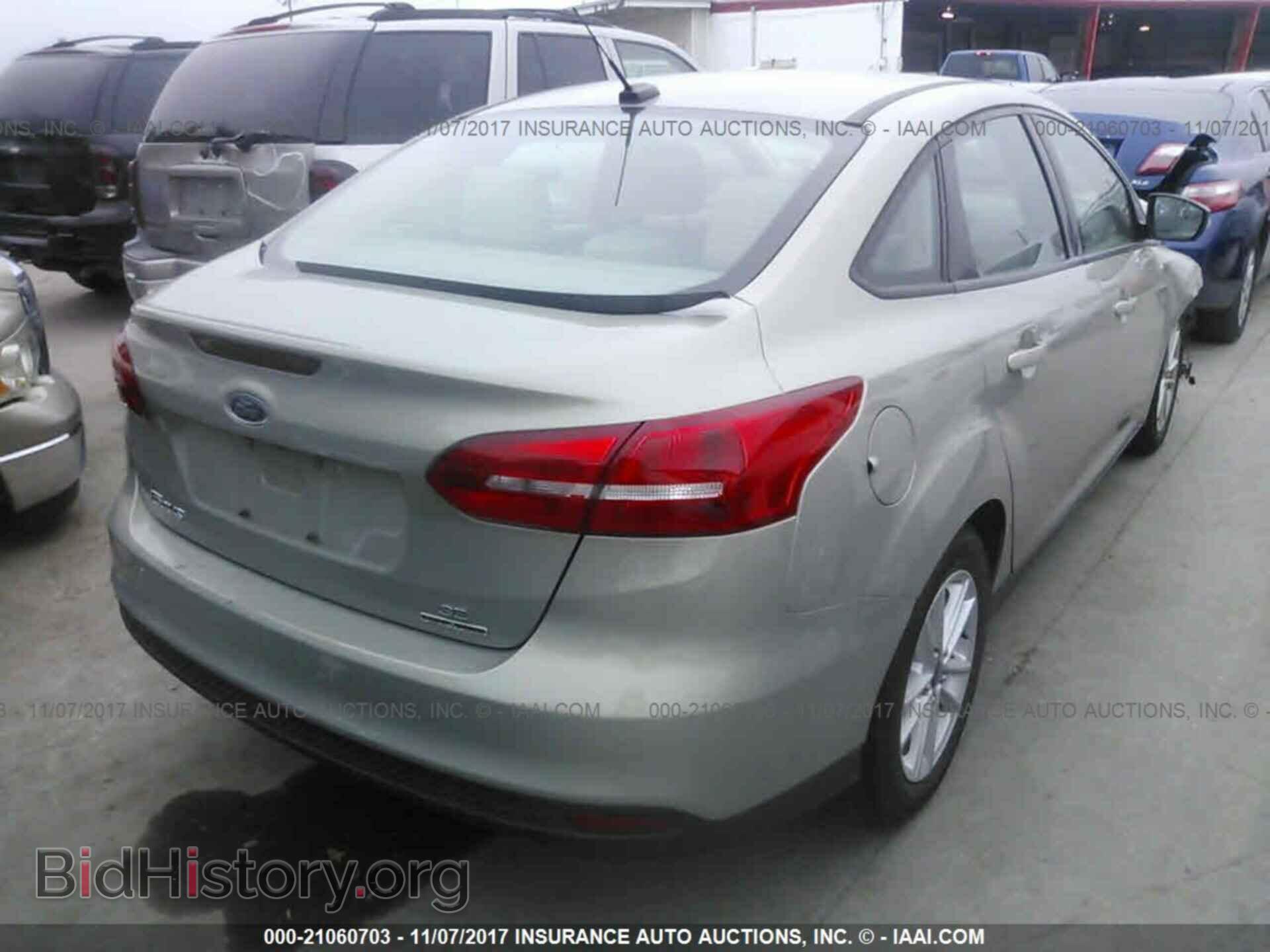 2015 Ford Focus - VIN: 1FADP3F22FL299561 - Photo 4