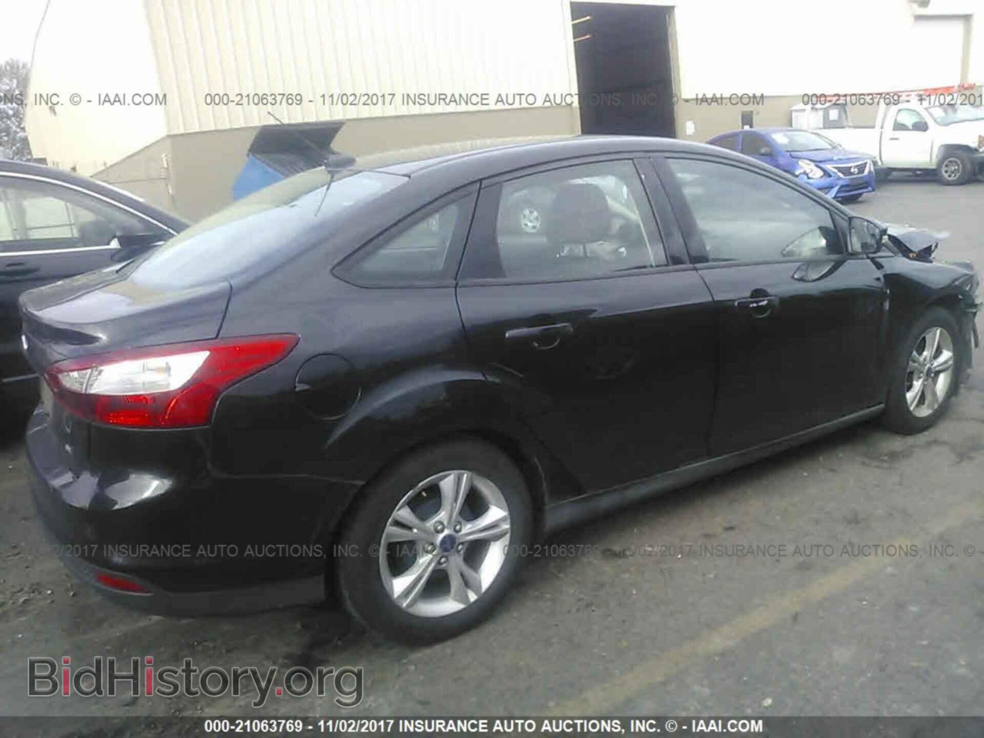 2014 Ford Focus - VIN: 1FADP3F24EL118457 - Photo 4