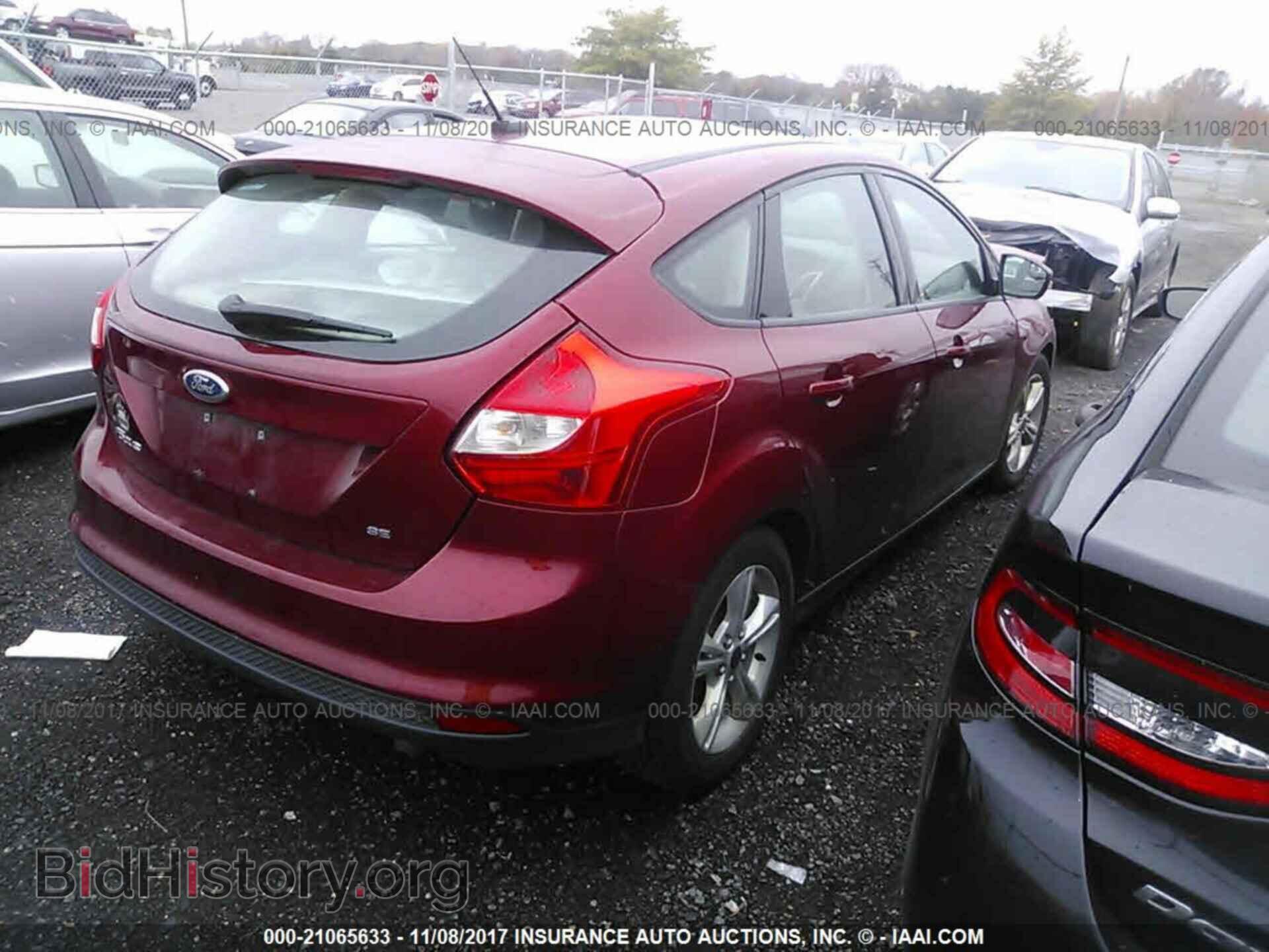 2014 Ford Focus - VIN: 1FADP3K25EL368747 - Photo 4