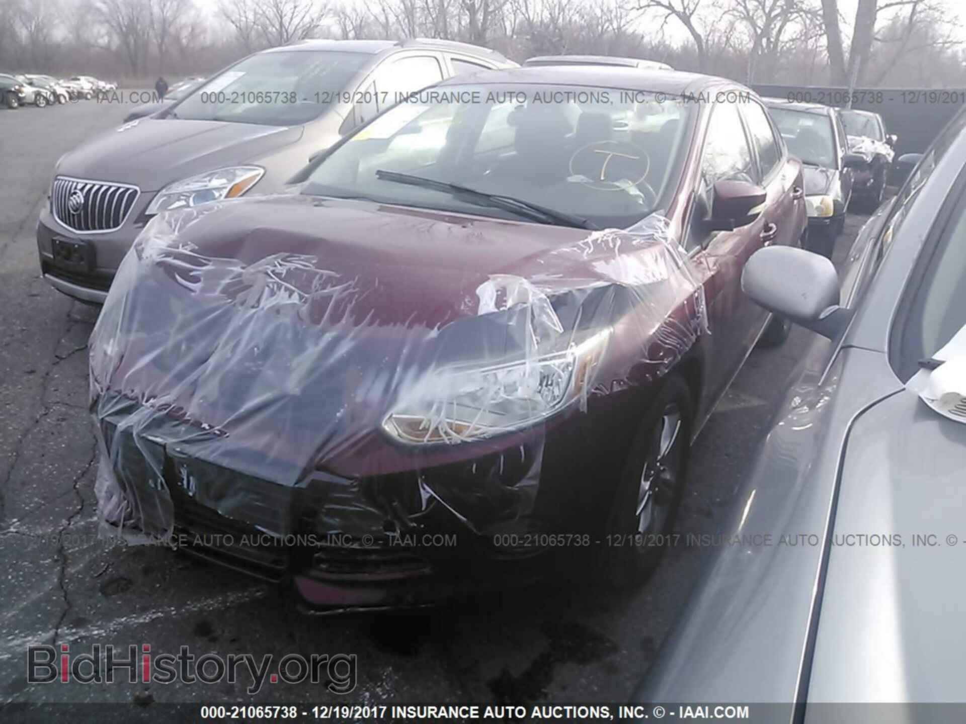 2014 Ford Focus - VIN: 1FADP3F22EL325798 - Фото 2