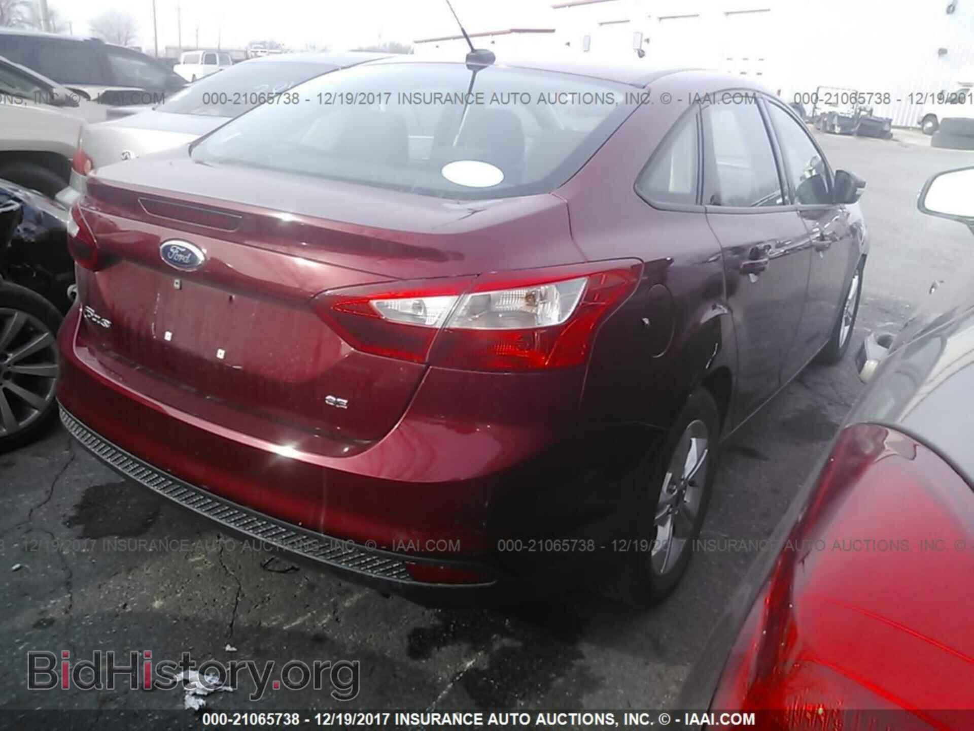 2014 Ford Focus - VIN: 1FADP3F22EL325798 - Фото 4