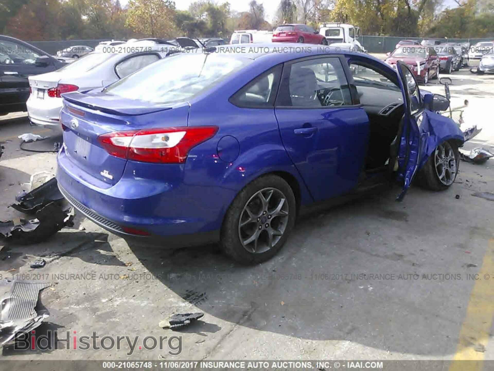 2013 Ford Focus - VIN: 1FADP3F26DL282906 - Фото 4