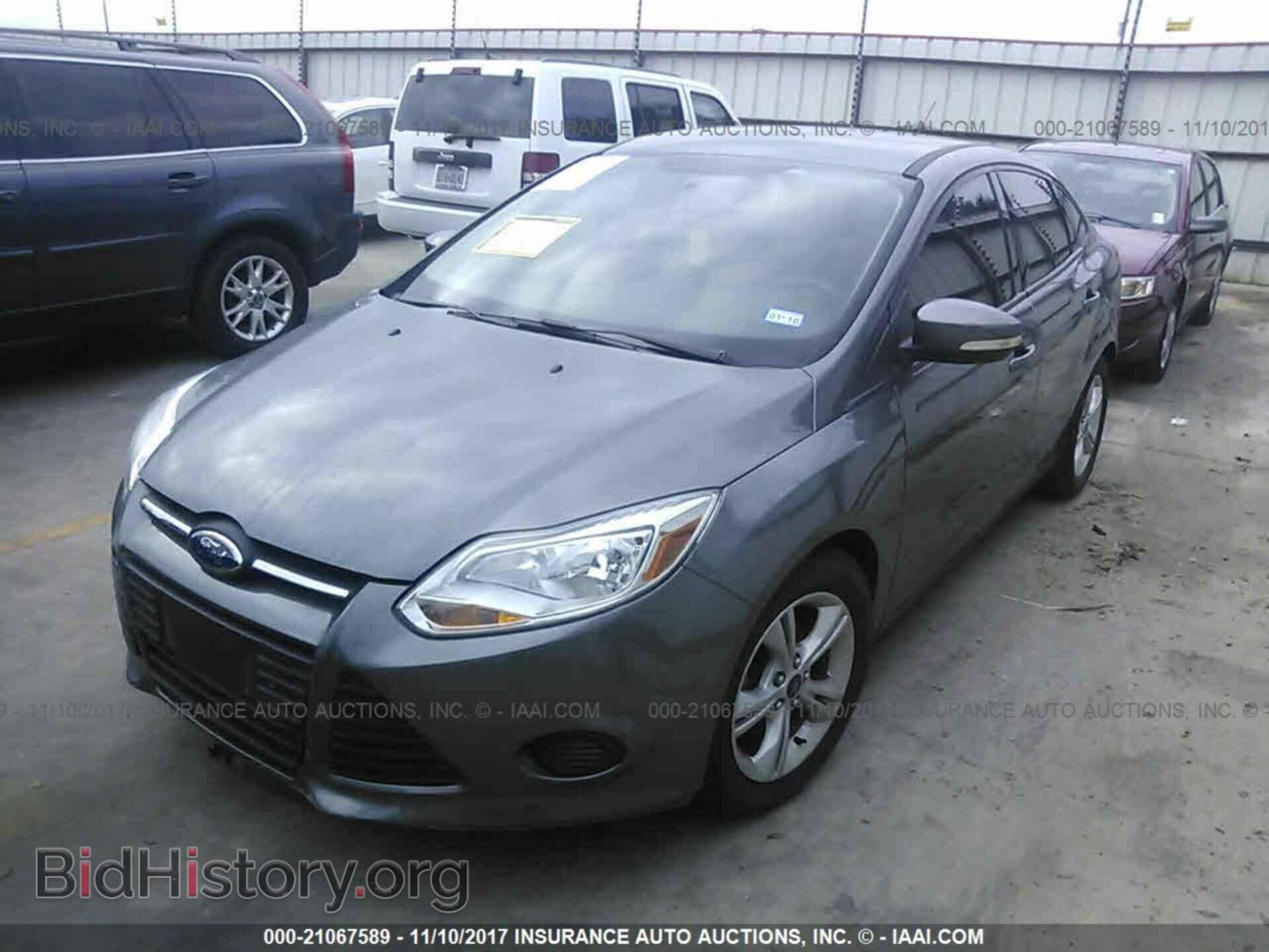 2014 Ford Focus - VIN: 1FADP3F29EL109088 - Фото 2