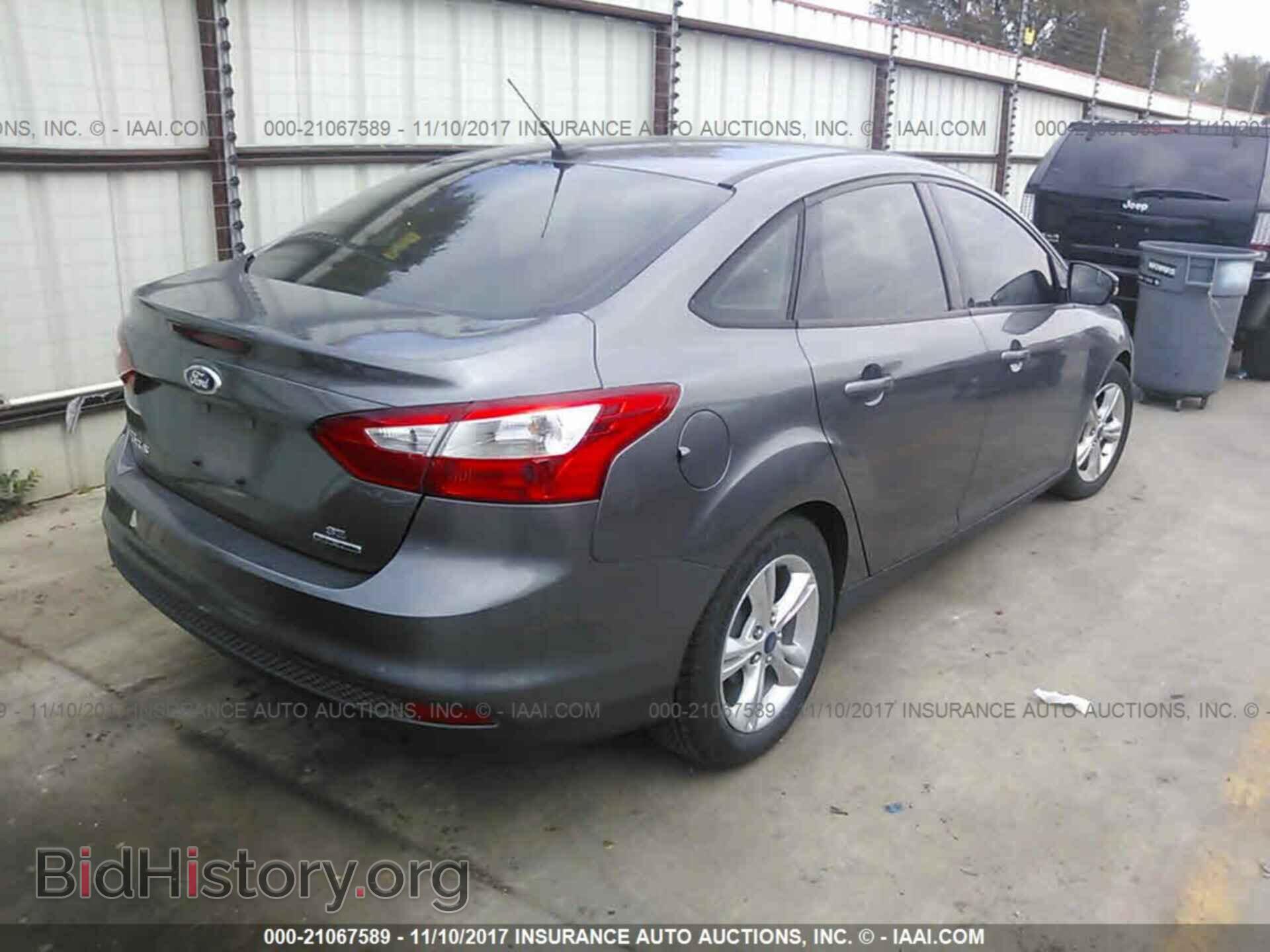 2014 Ford Focus - VIN: 1FADP3F29EL109088 - Фото 4