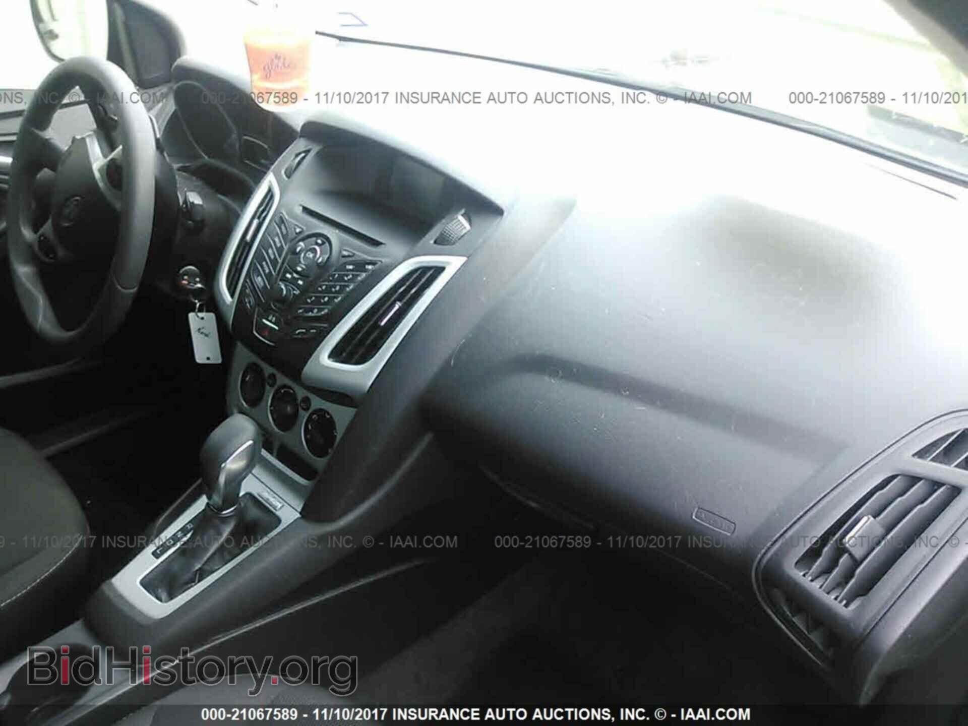 2014 Ford Focus - VIN: 1FADP3F29EL109088 - Фото 5