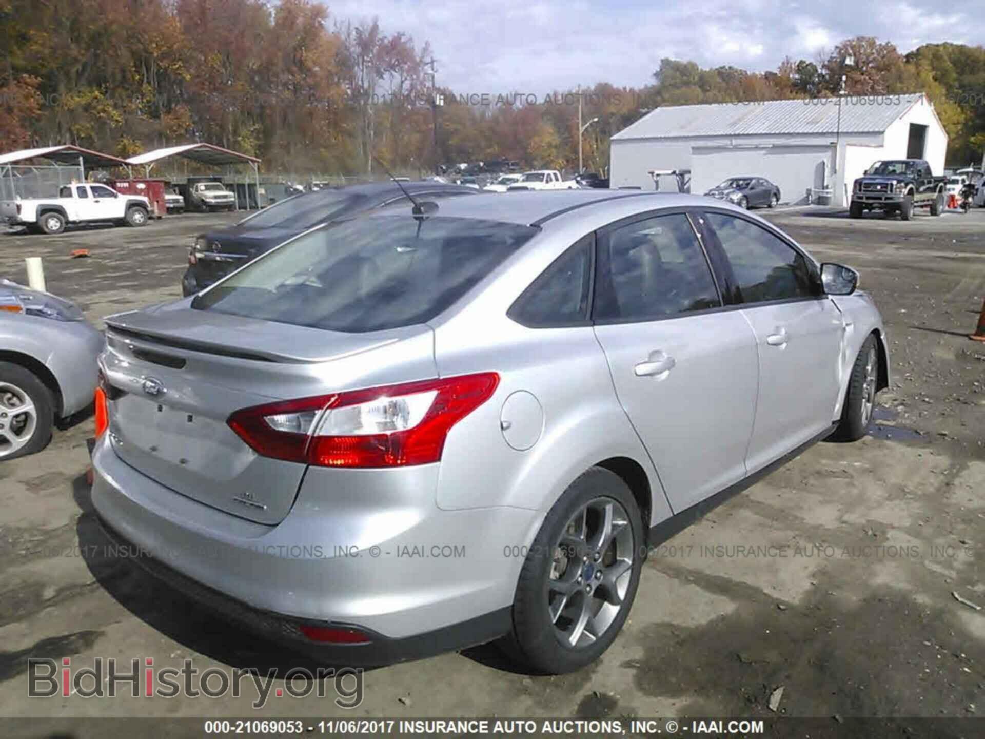 2014 Ford Focus - VIN: 1FADP3F22EL240749 - Photo 4