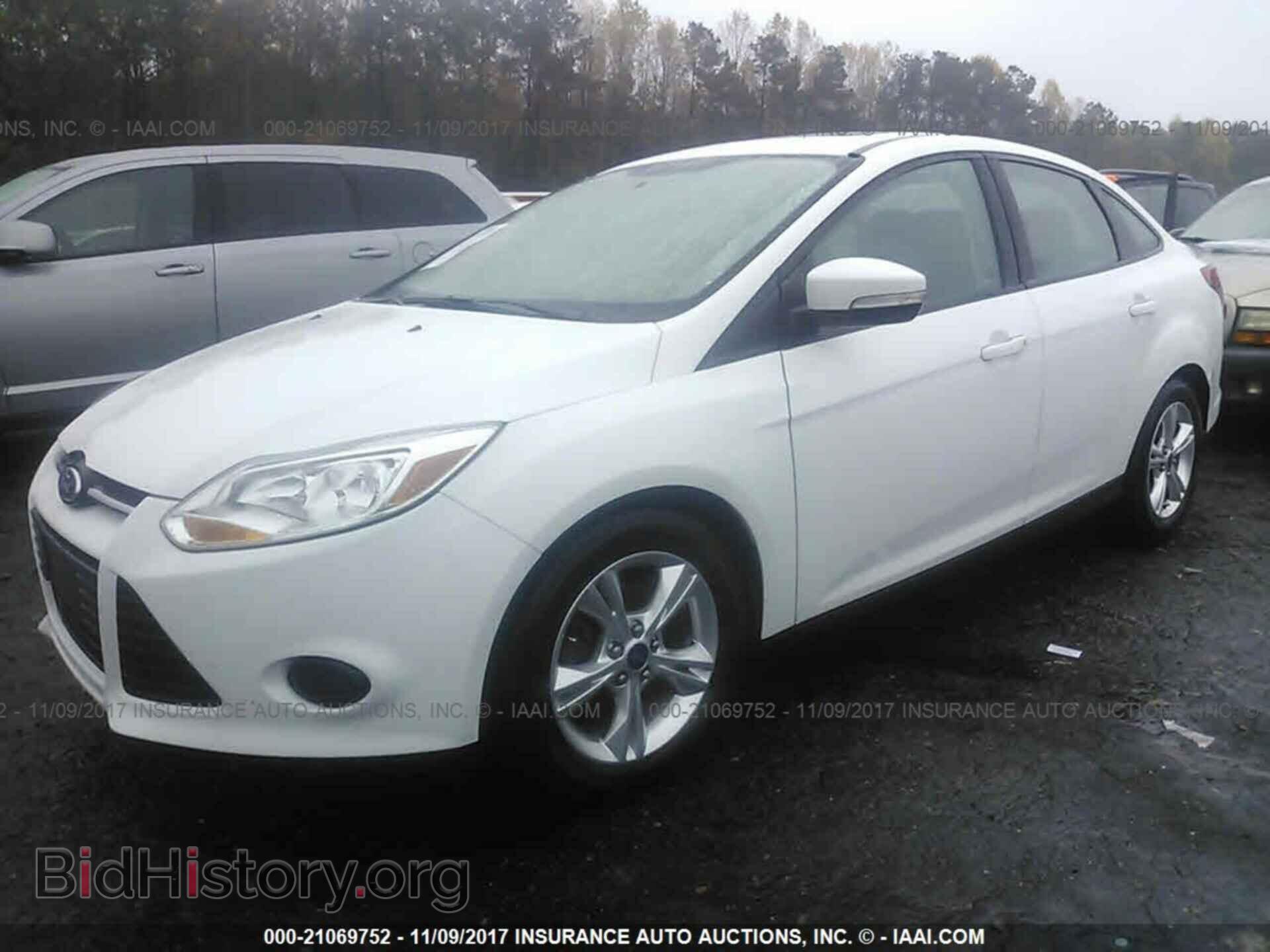 2014 Ford Focus - VIN: 1FADP3F21EL227328 - Photo 2