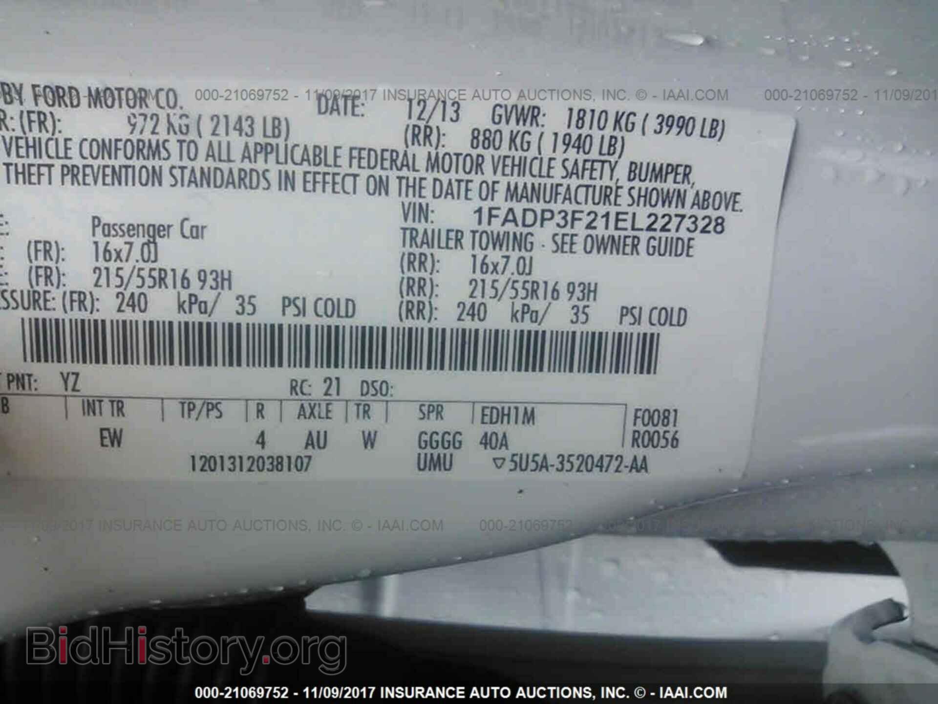 2014 Ford Focus - VIN: 1FADP3F21EL227328 - Photo 9
