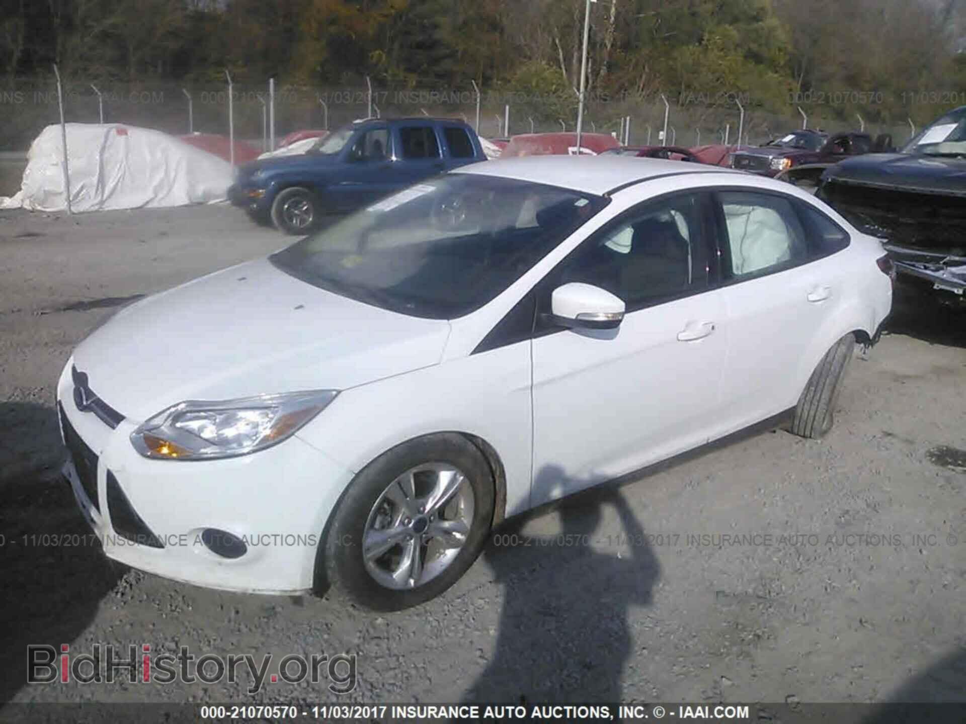 2014 Ford Focus - VIN: 1FADP3F24EL304886 - Photo 2