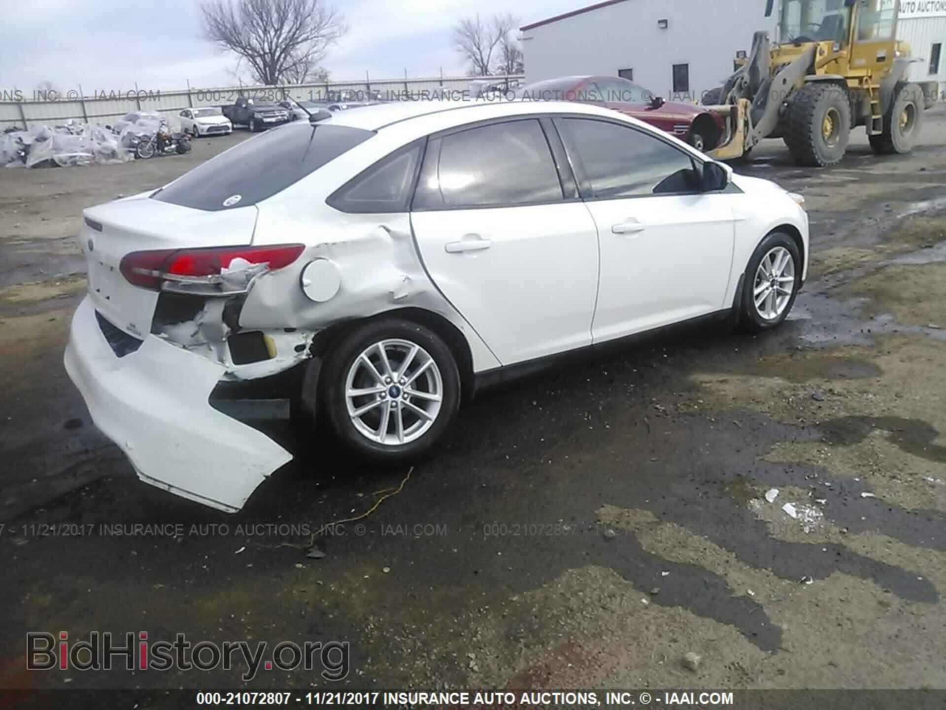 2015 Ford Focus - VIN: 1FADP3F22FL215044 - Photo 4
