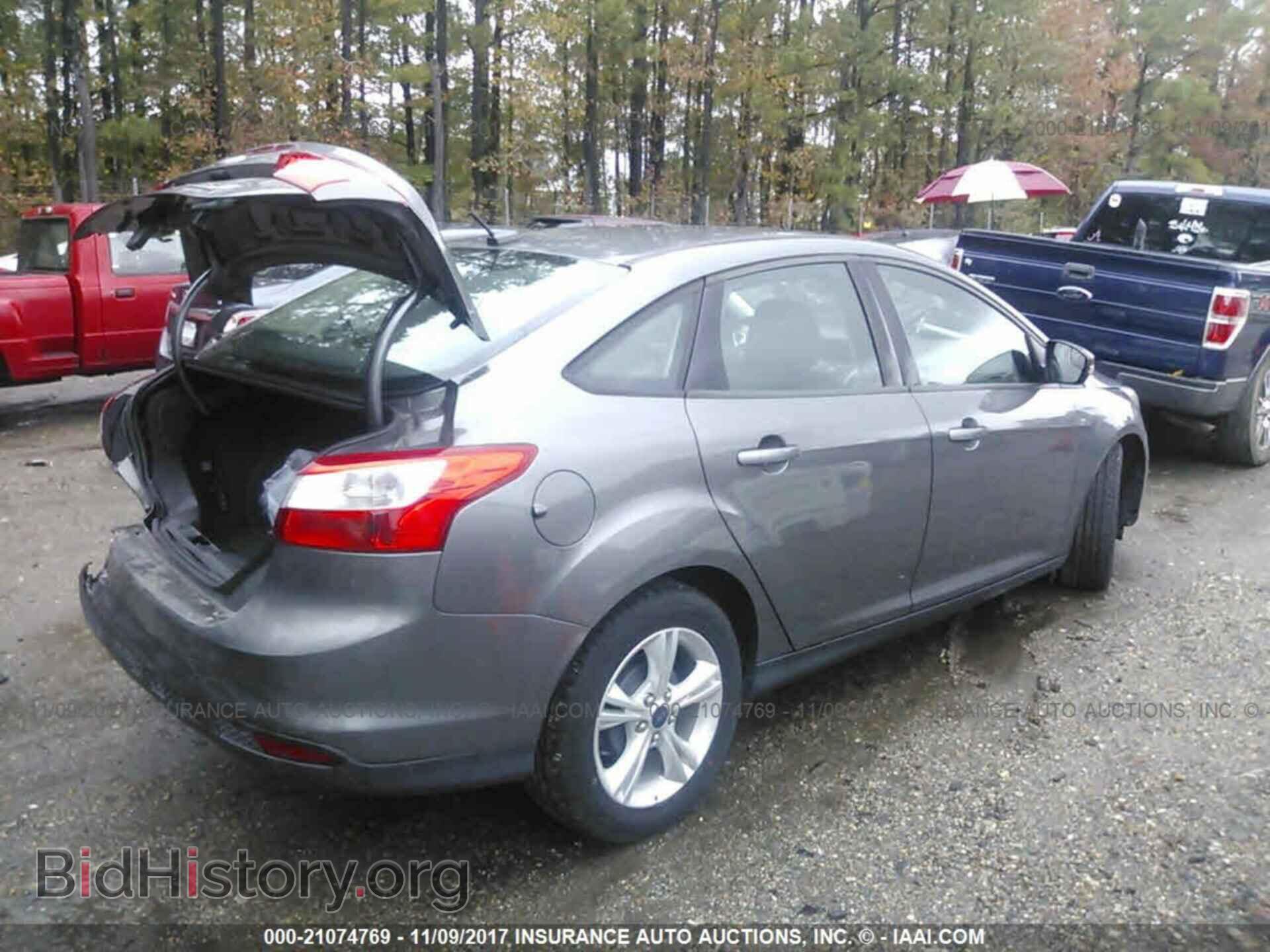 2013 Ford Focus - VIN: 1FADP3F26DL291704 - Фото 4