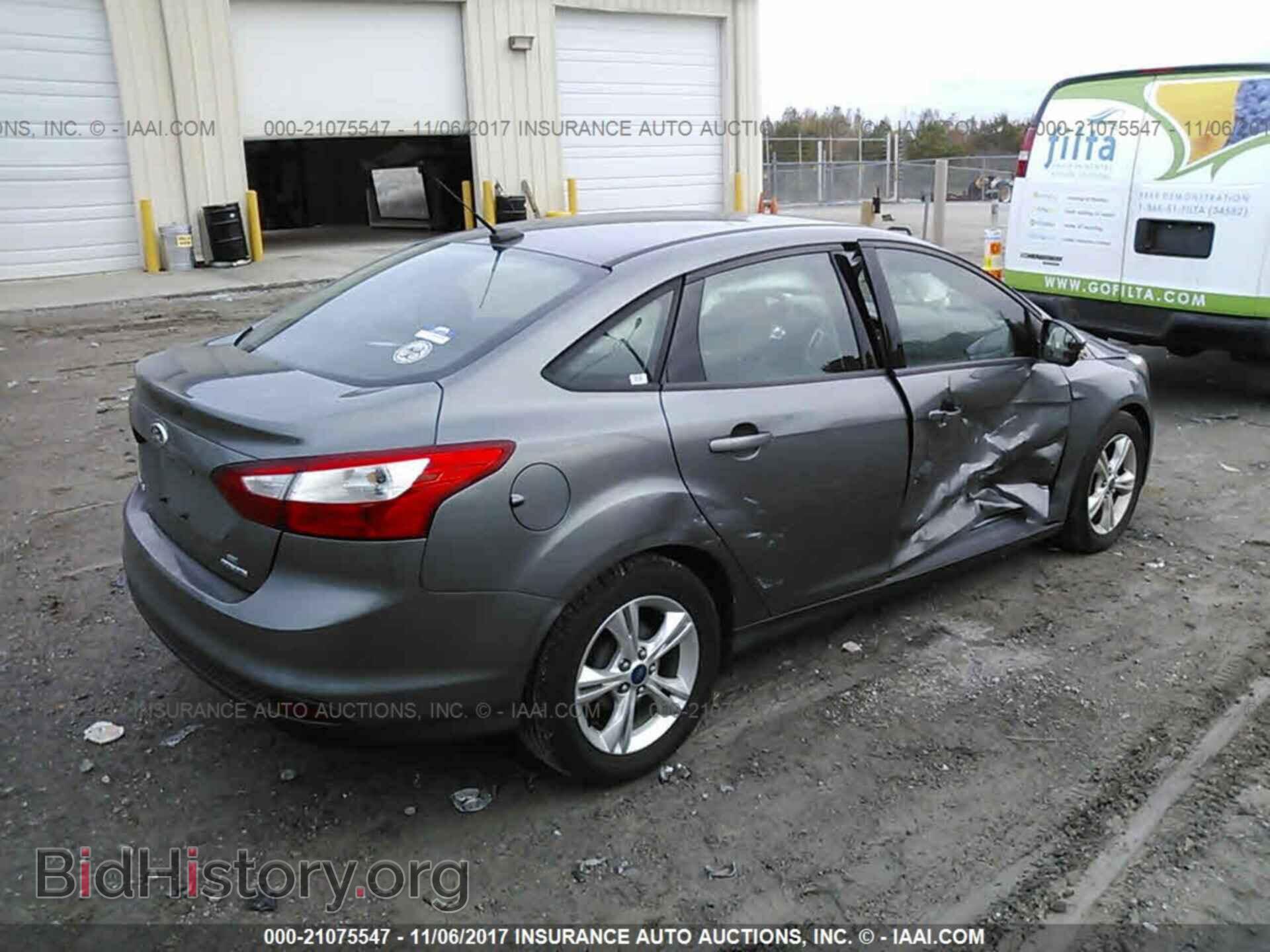 2013 Ford Focus - VIN: 1FADP3F24DL314123 - Photo 4