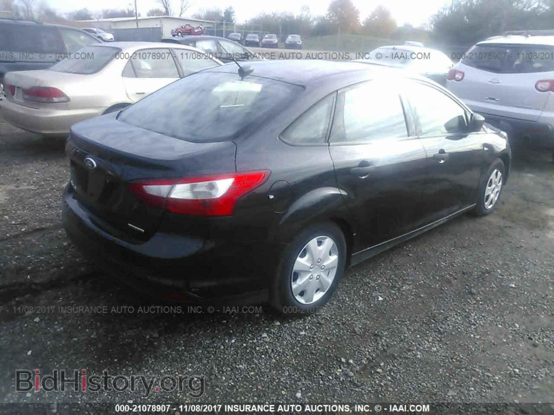 2014 Ford Focus - VIN: 1FADP3E21EL106302 - Фото 4