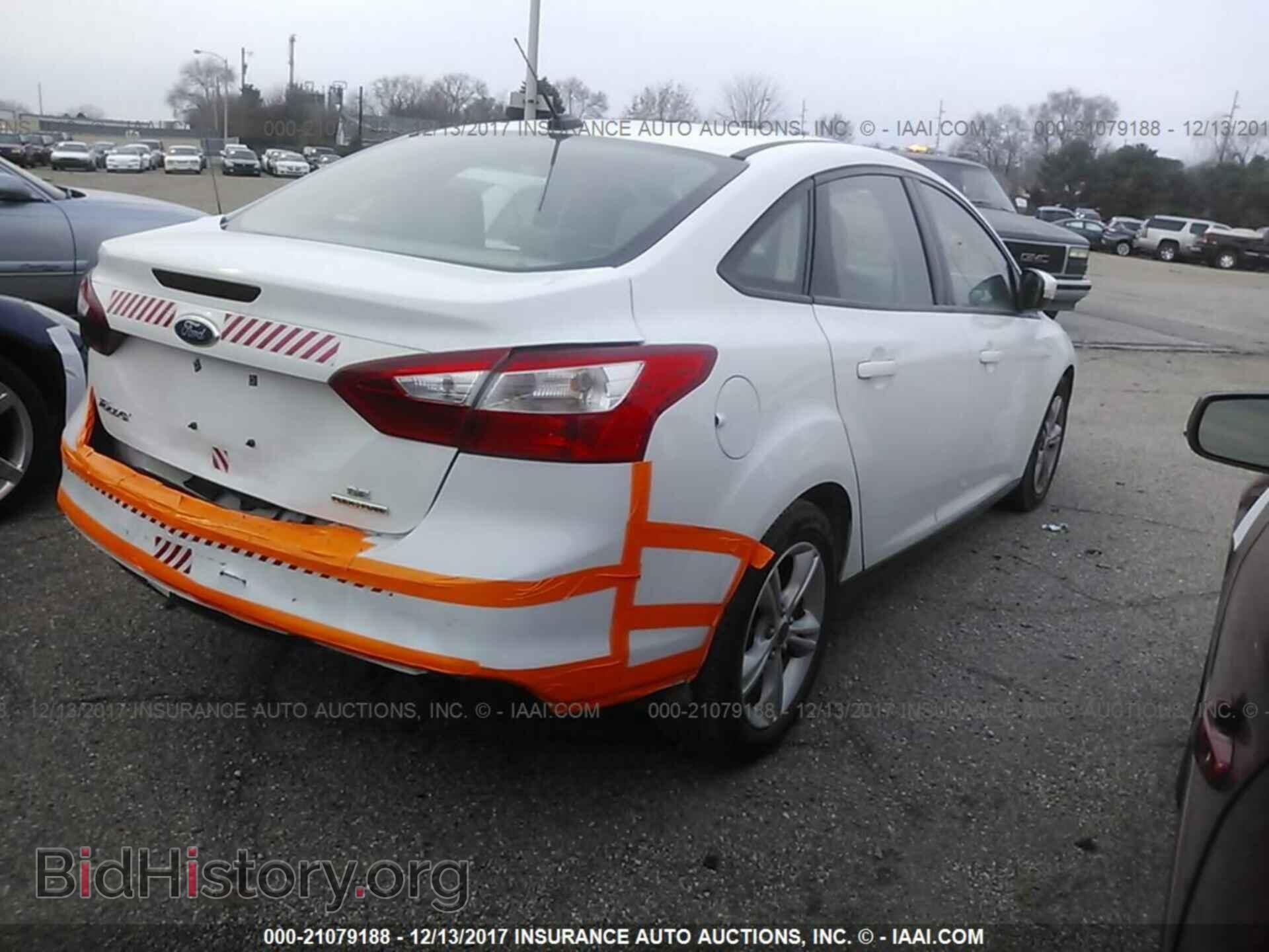 2014 Ford Focus - VIN: 1FADP3F20EL263379 - Photo 4