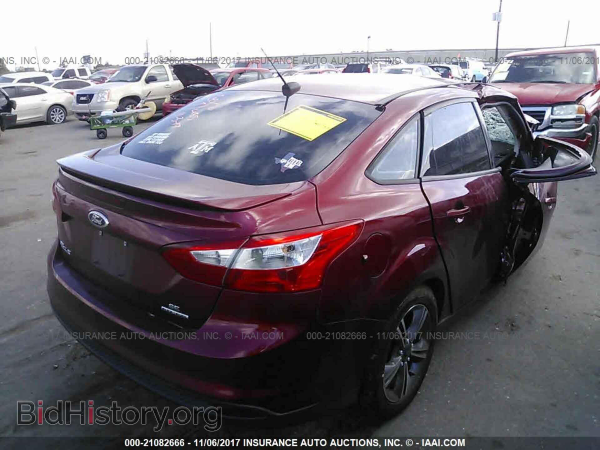 2014 Ford Focus - VIN: 1FADP3F28EL340693 - Photo 4