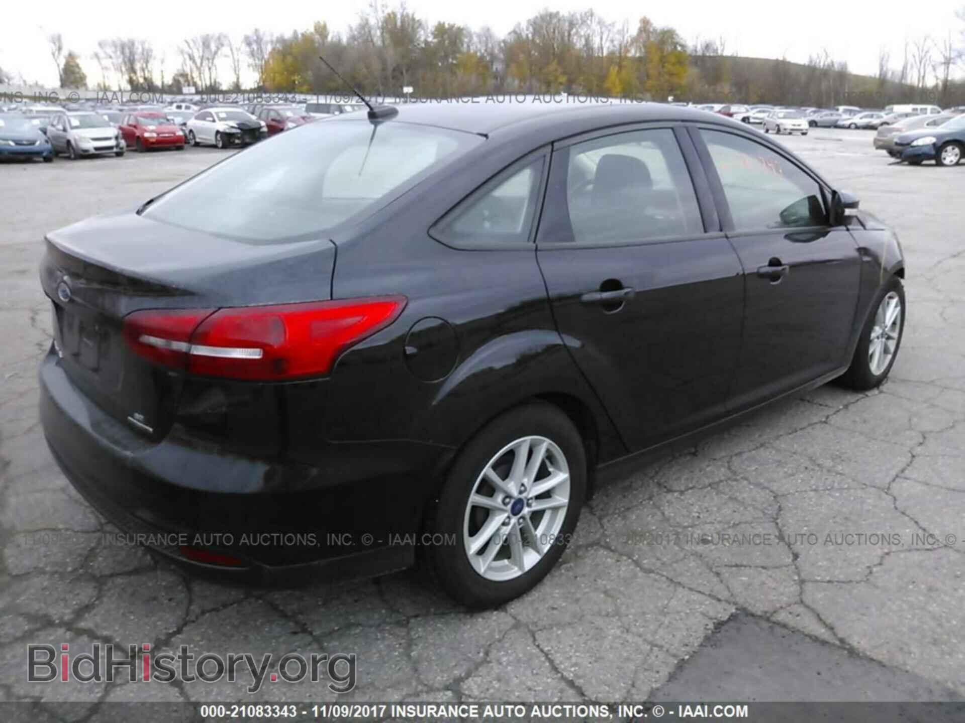 2016 Ford Focus - VIN: 1FADP3F24GL214186 - Photo 4