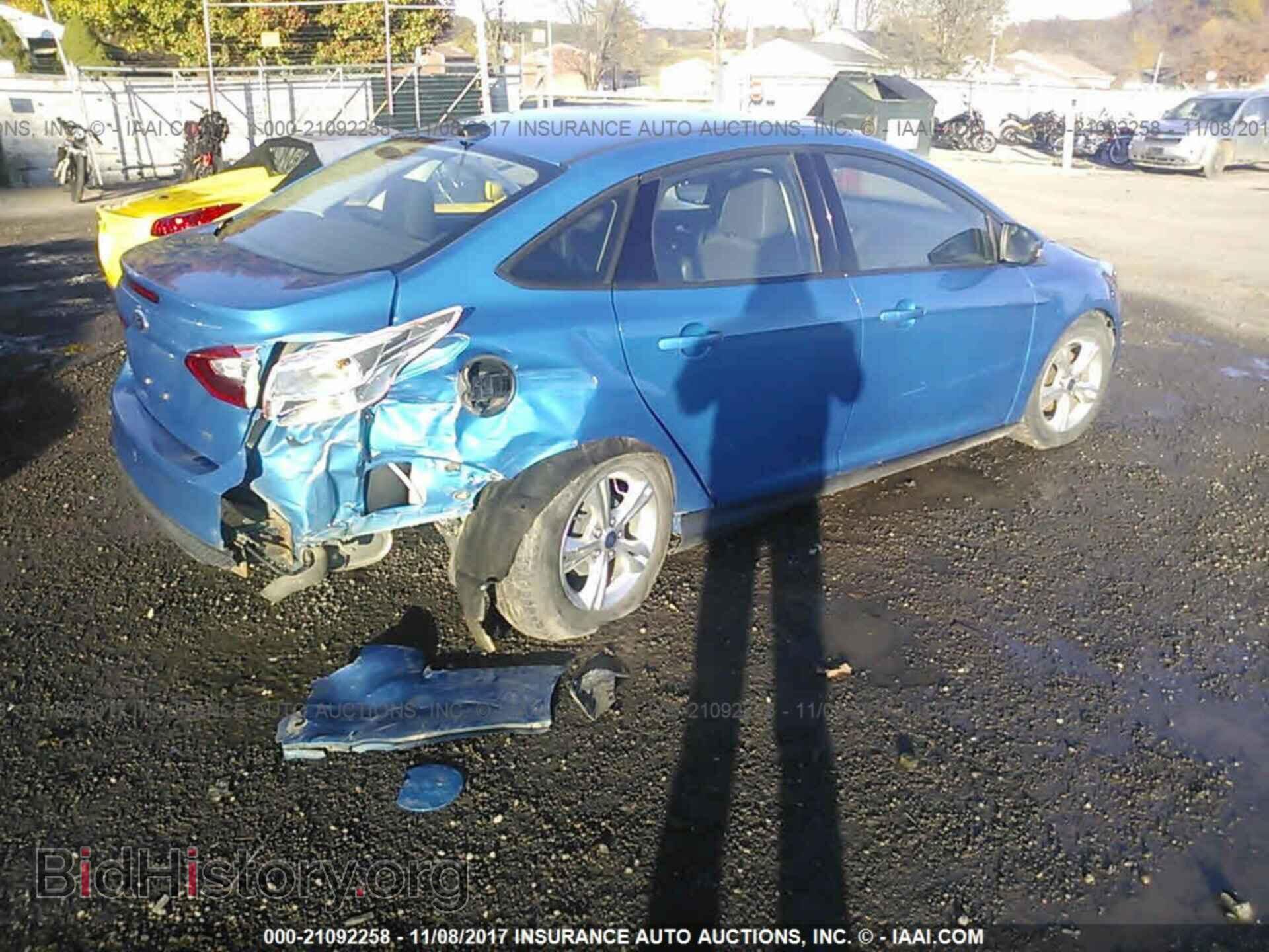 2013 Ford Focus - VIN: 1FADP3F25DL317239 - Photo 4