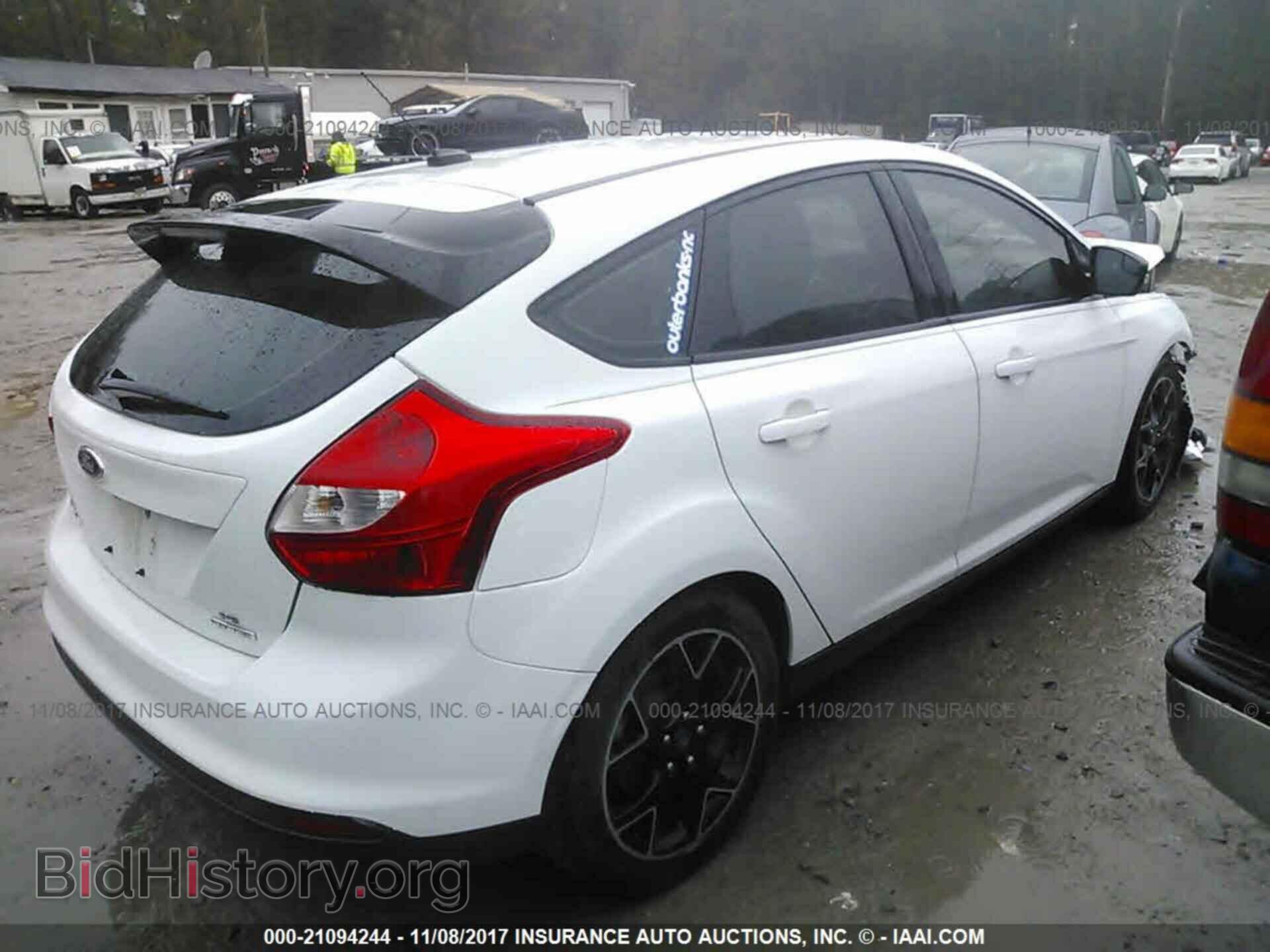 2013 Ford Focus - VIN: 1FADP3K28DL203628 - Фото 4