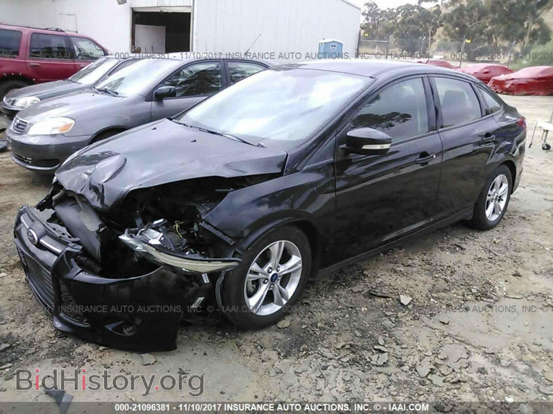 2014 Ford Focus - VIN: 1FADP3F22EL281835 - Photo 2
