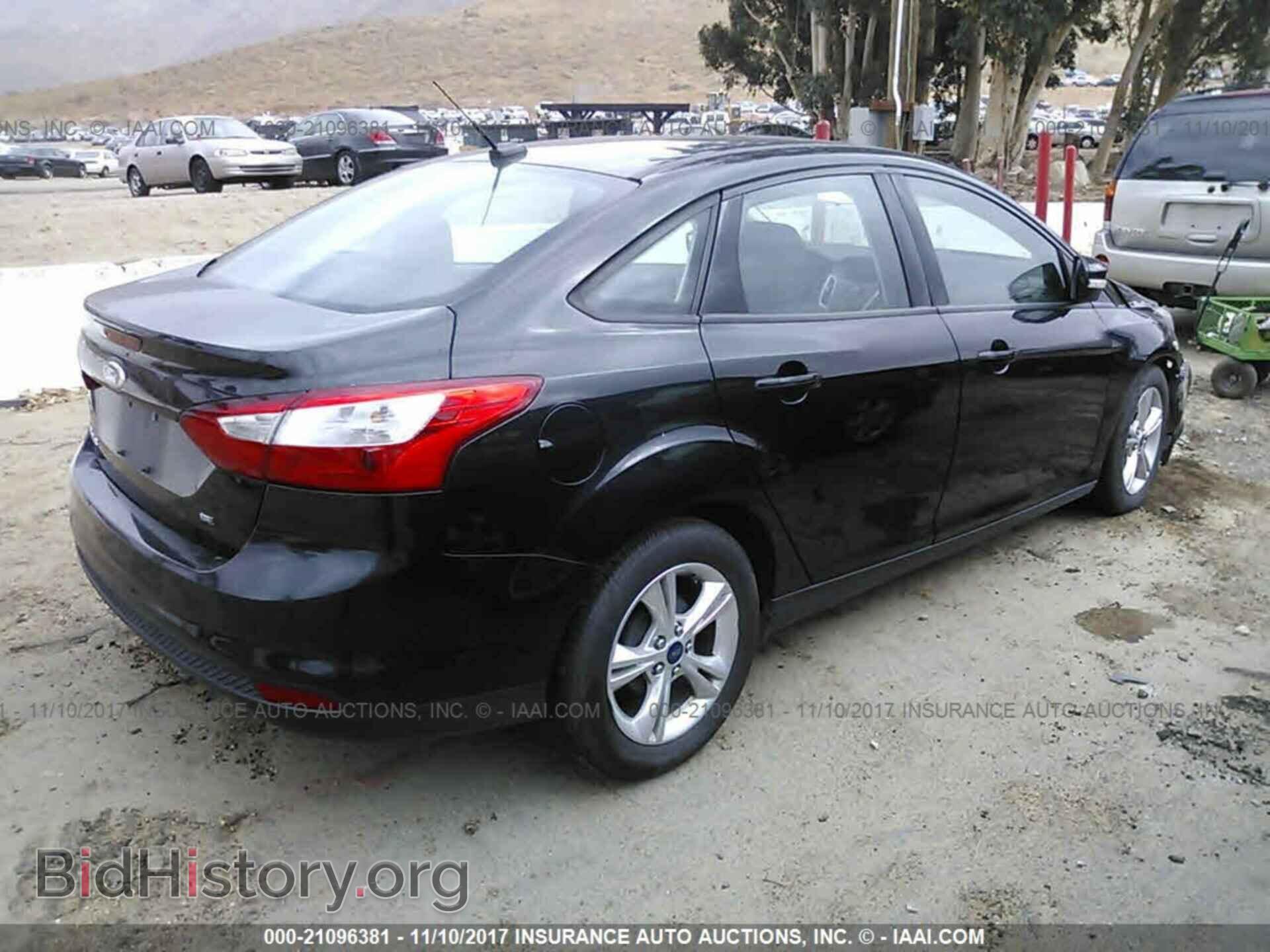 2014 Ford Focus - VIN: 1FADP3F22EL281835 - Photo 4