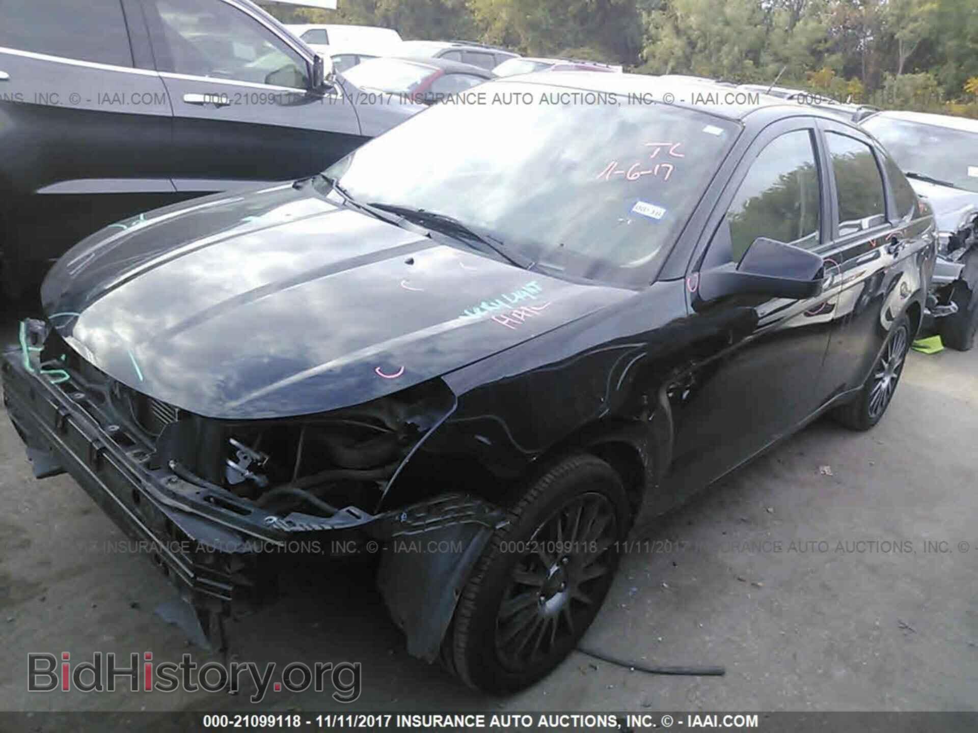 2011 Ford Focus - VIN: 1FAHP3GN3BW108281 - Photo 2