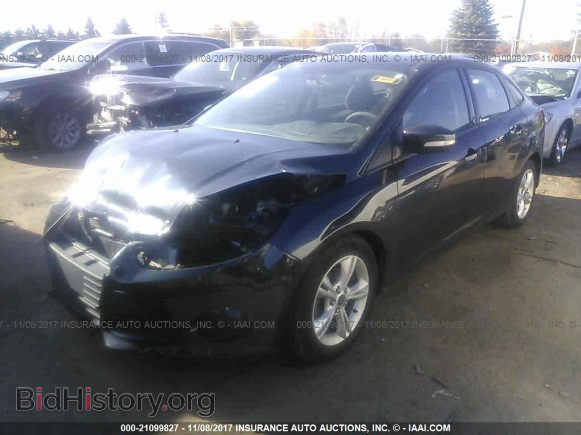 2014 Ford Focus - VIN: 1FADP3F27EL207035 - Фото 2