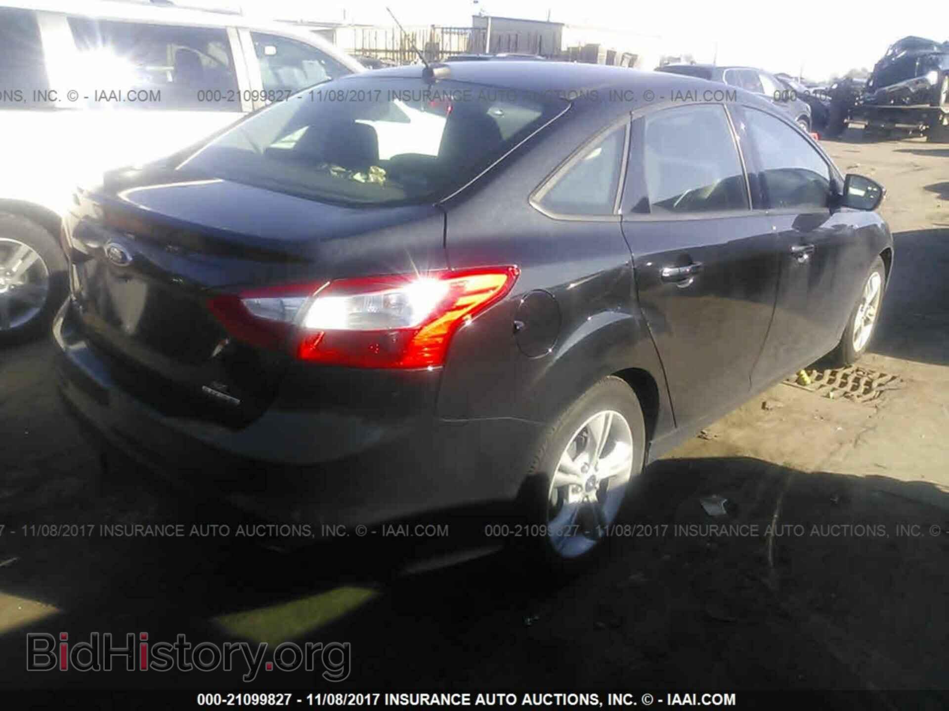 2014 Ford Focus - VIN: 1FADP3F27EL207035 - Фото 4