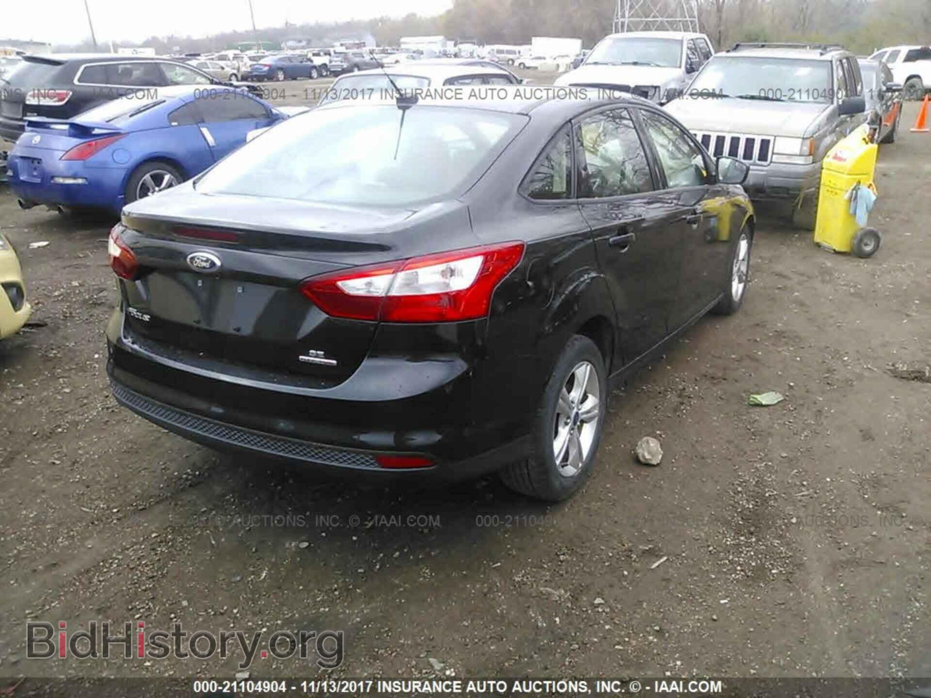 2013 Ford Focus - VIN: 1FADP3F21DL199948 - Фото 4