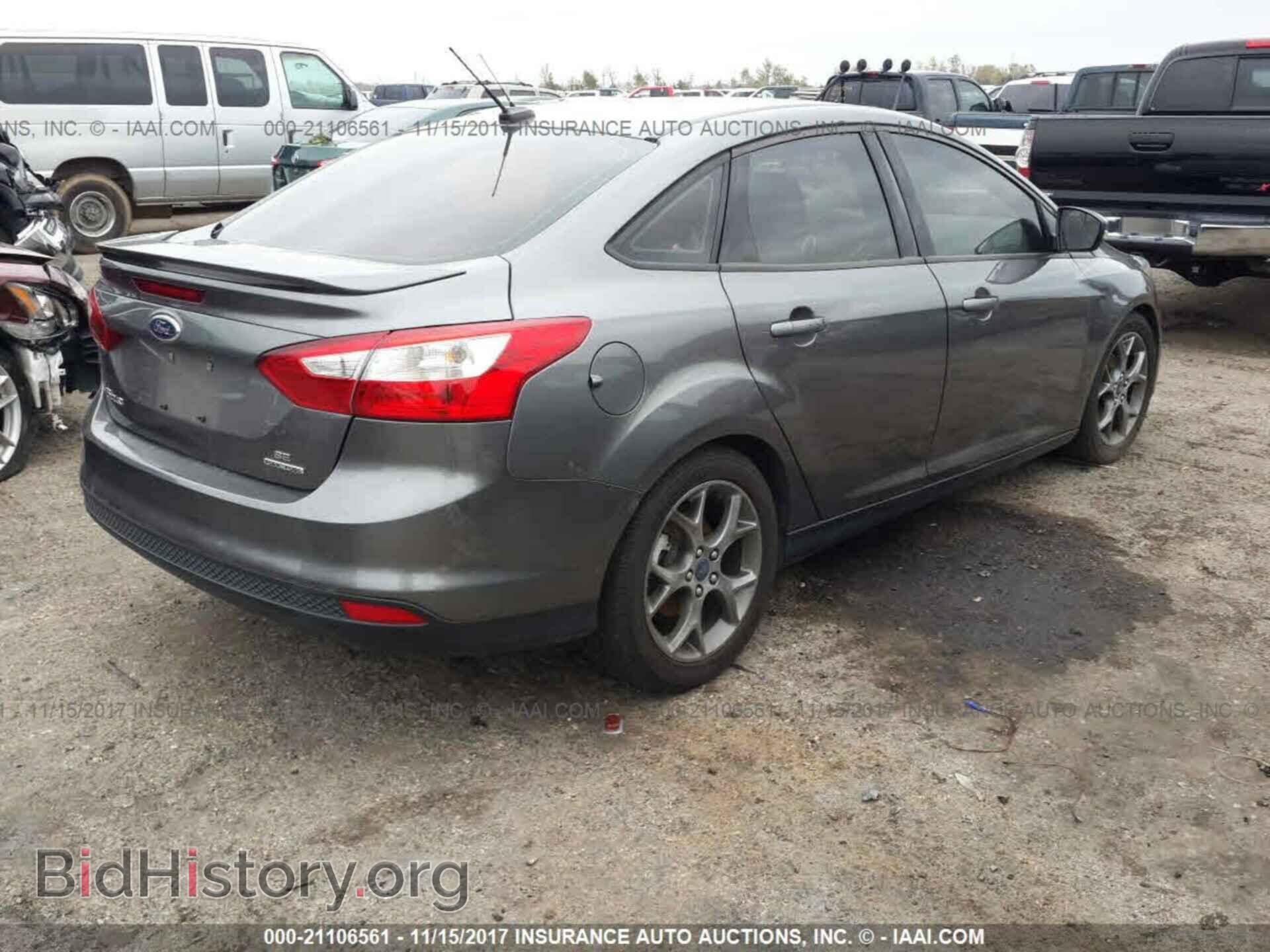 2014 Ford Focus - VIN: 1FADP3F24EL122931 - Photo 4