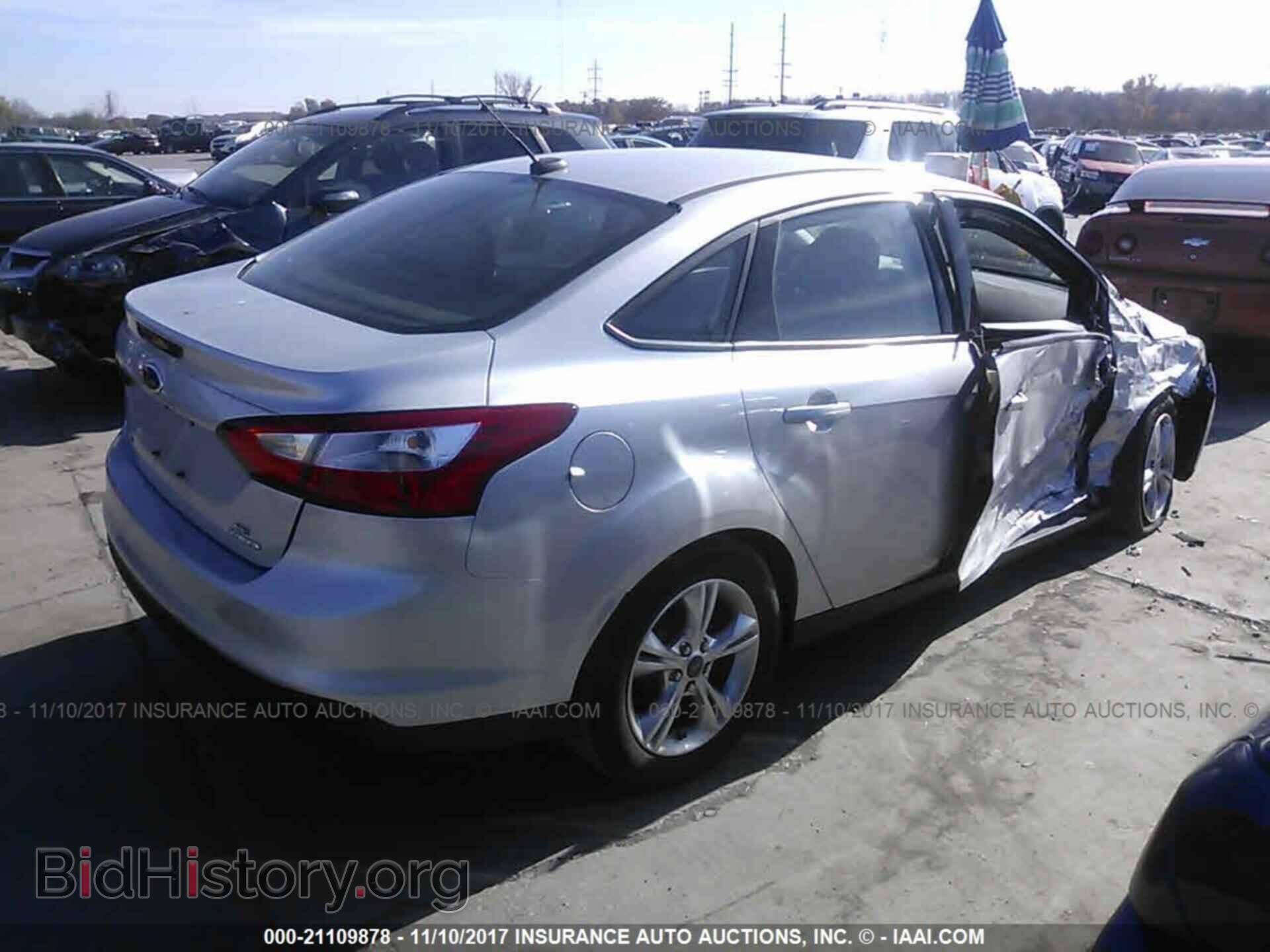 2014 Ford Focus - VIN: 1FADP3F24EL371973 - Фото 4
