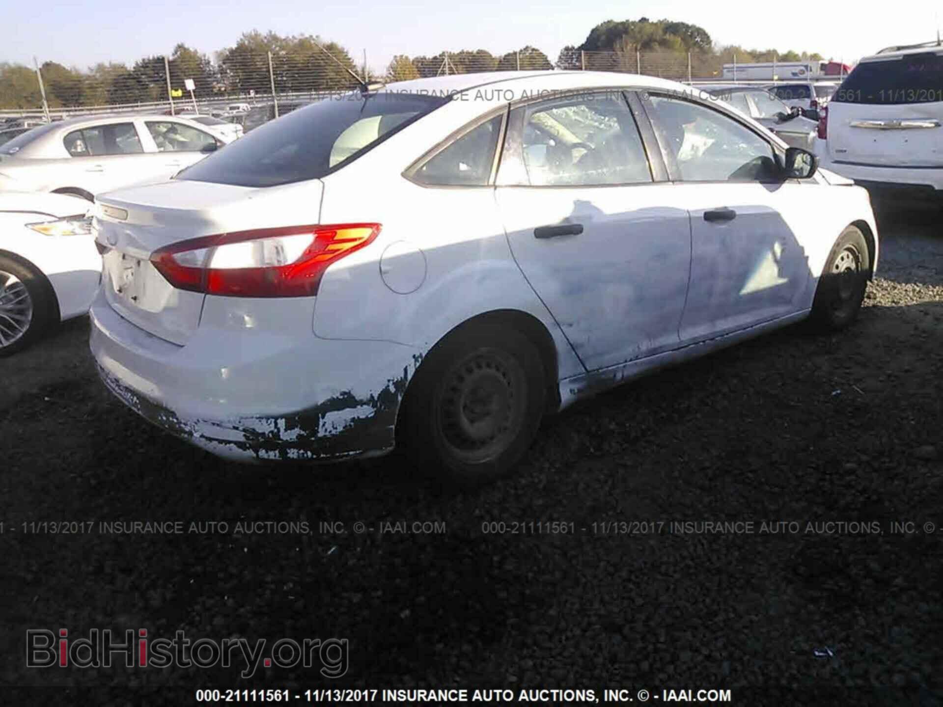 2014 Ford Focus - VIN: 1FADP3E2XEL263732 - Photo 4