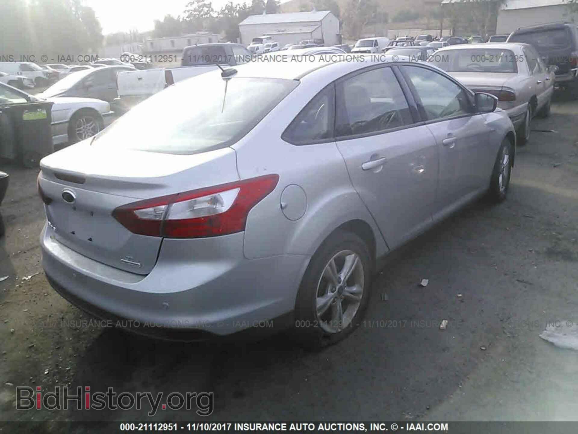 2014 Ford Focus - VIN: 1FADP3F23EL241814 - Photo 4