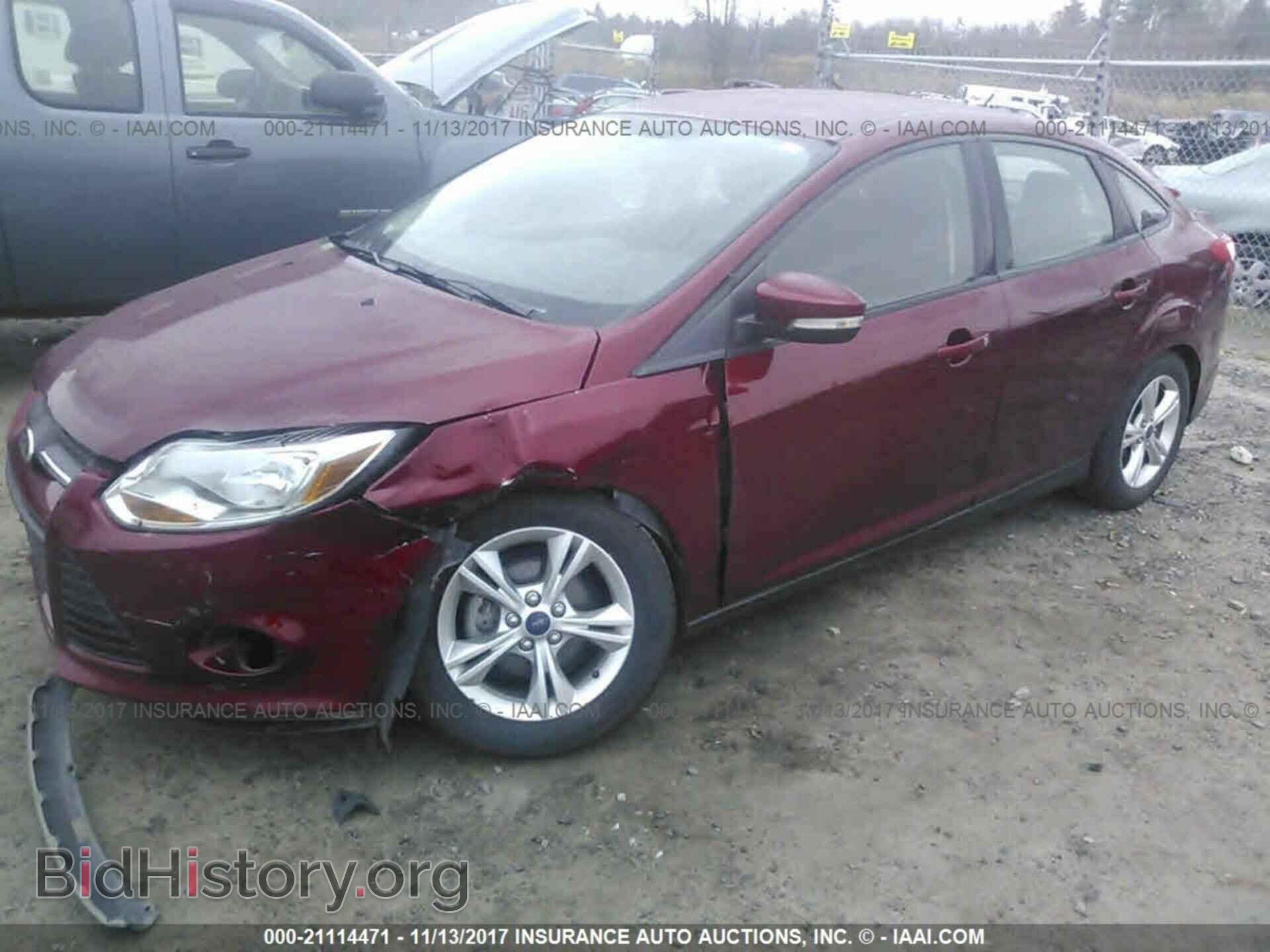 2014 Ford Focus - VIN: 1FADP3F20EL242970 - Photo 2