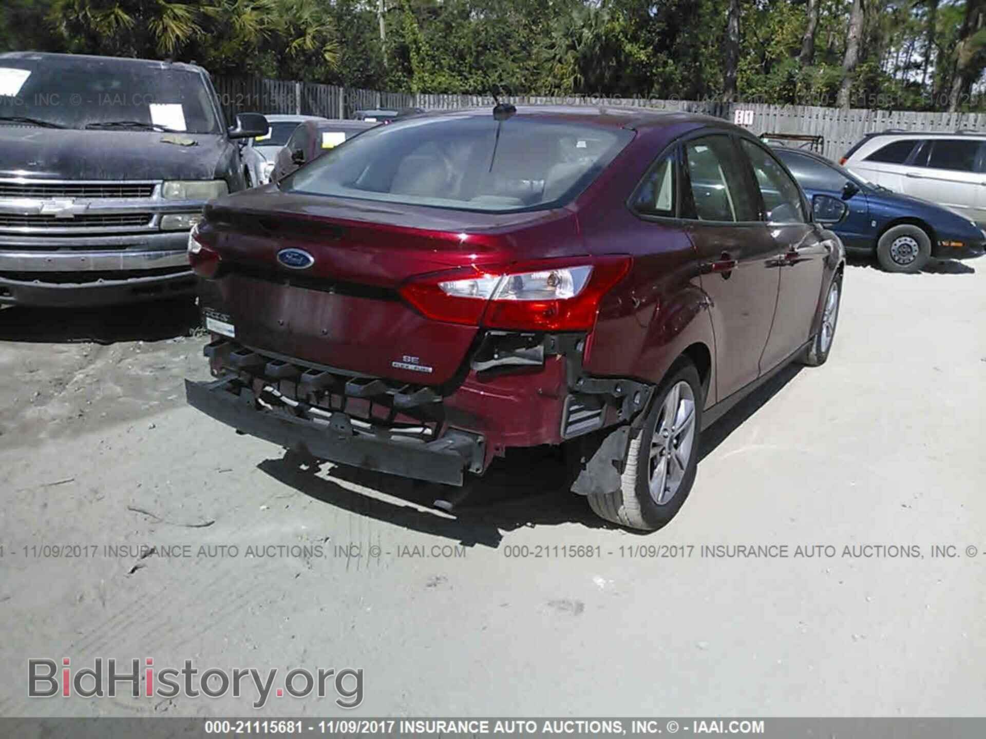 2014 Ford Focus - VIN: 1FADP3F2XEL387675 - Photo 4